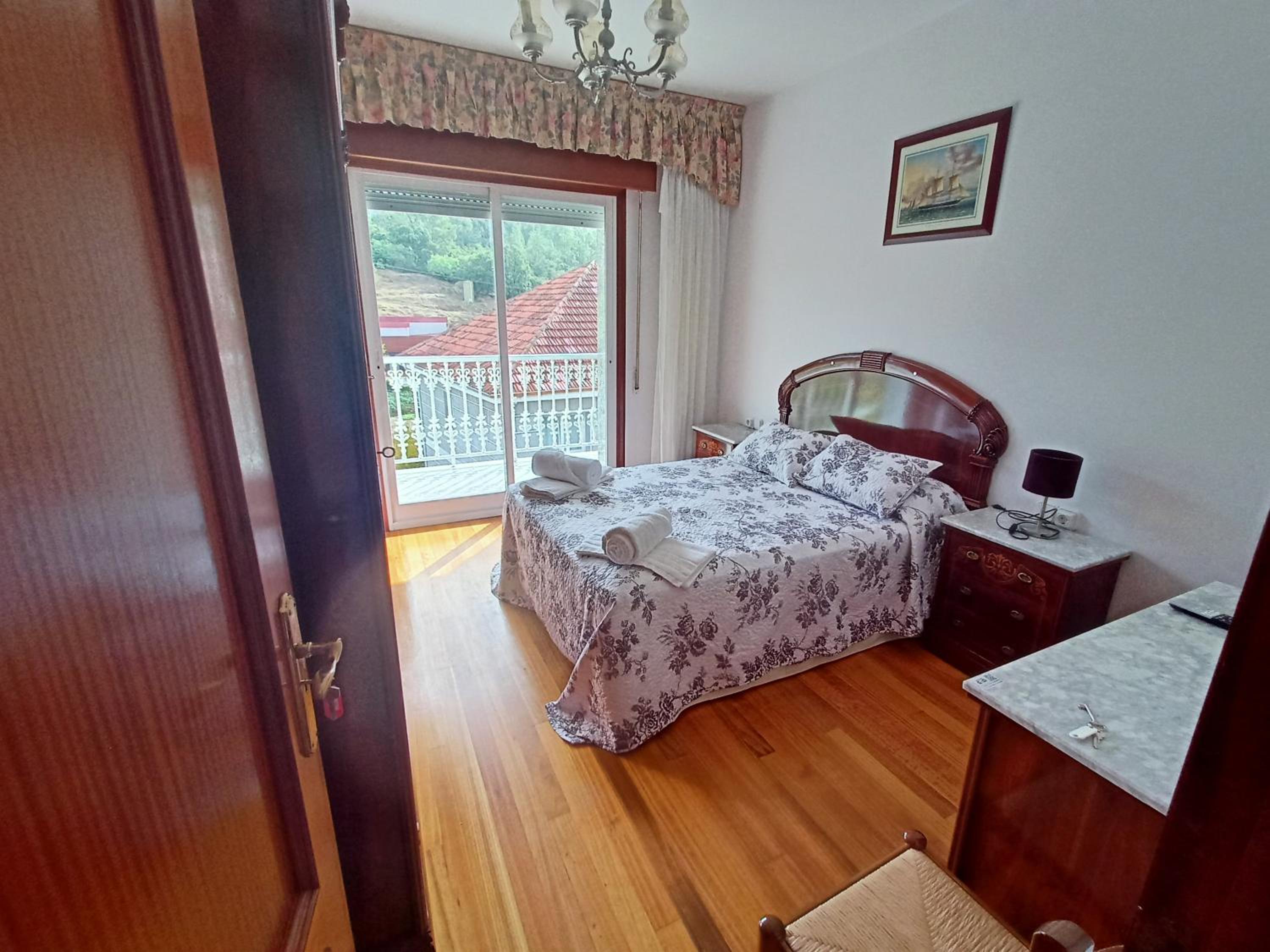 Habitación Doble con Balcón y Baño Compartido