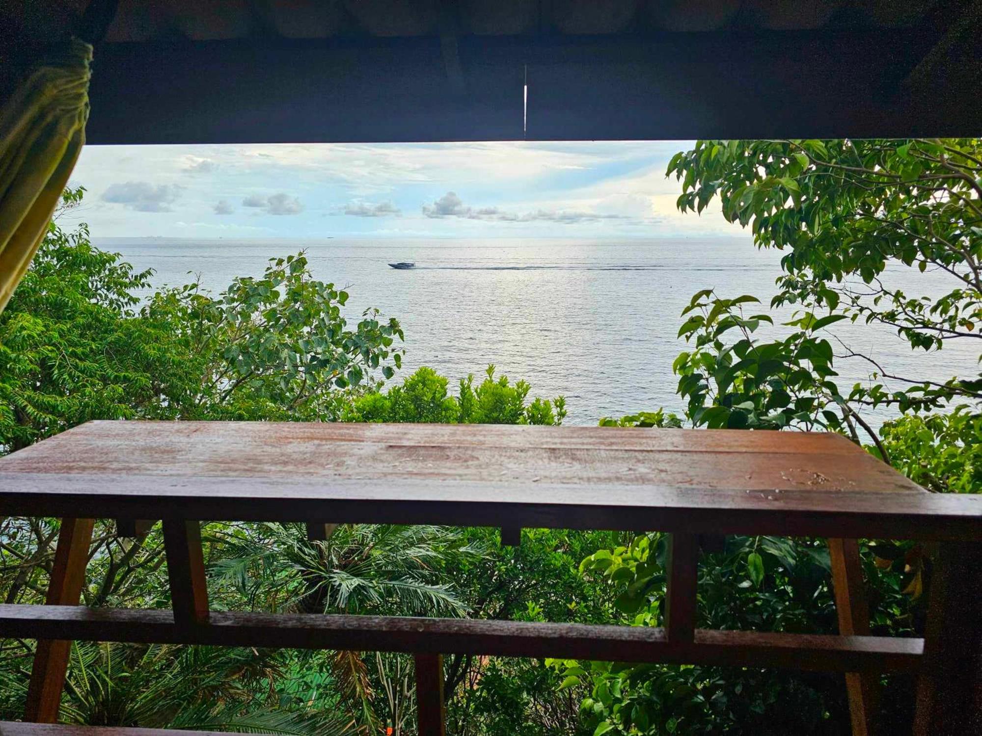 Deluxe Triple Room with Sea View - Photo 13