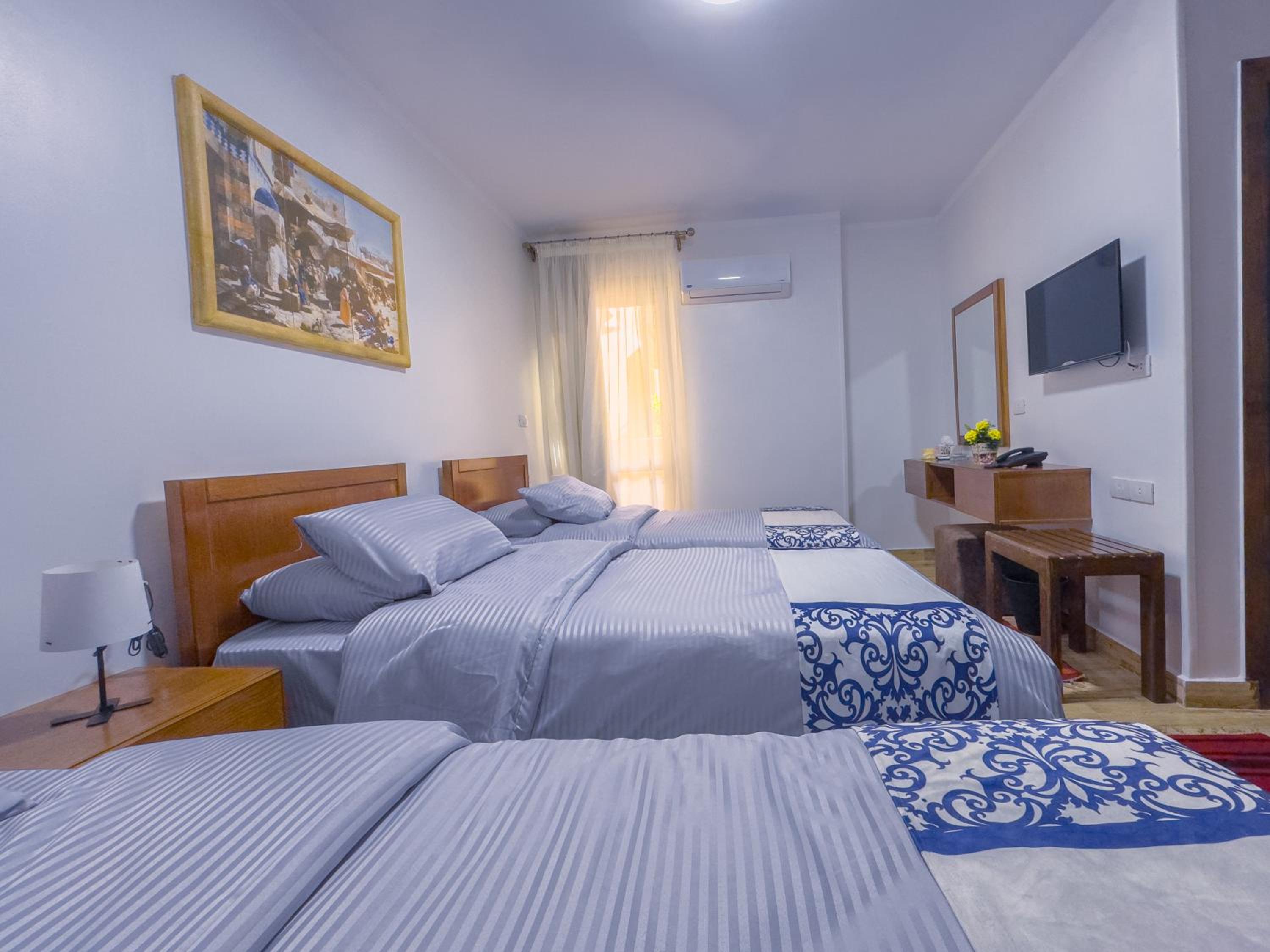 Premium Quadruple Room thumbnail 5