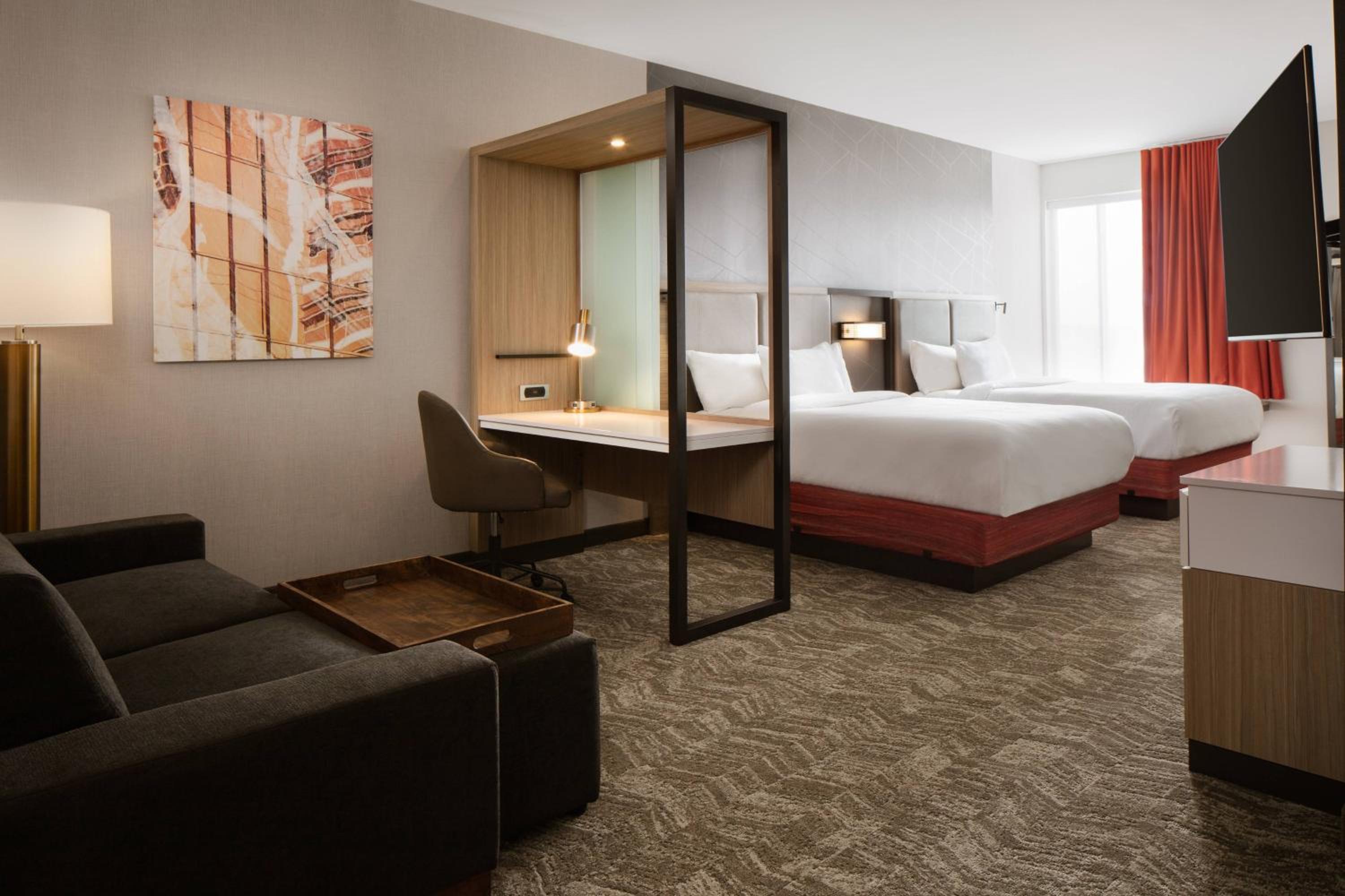Suite with Two Queen Beds and a sofa - Photo 1