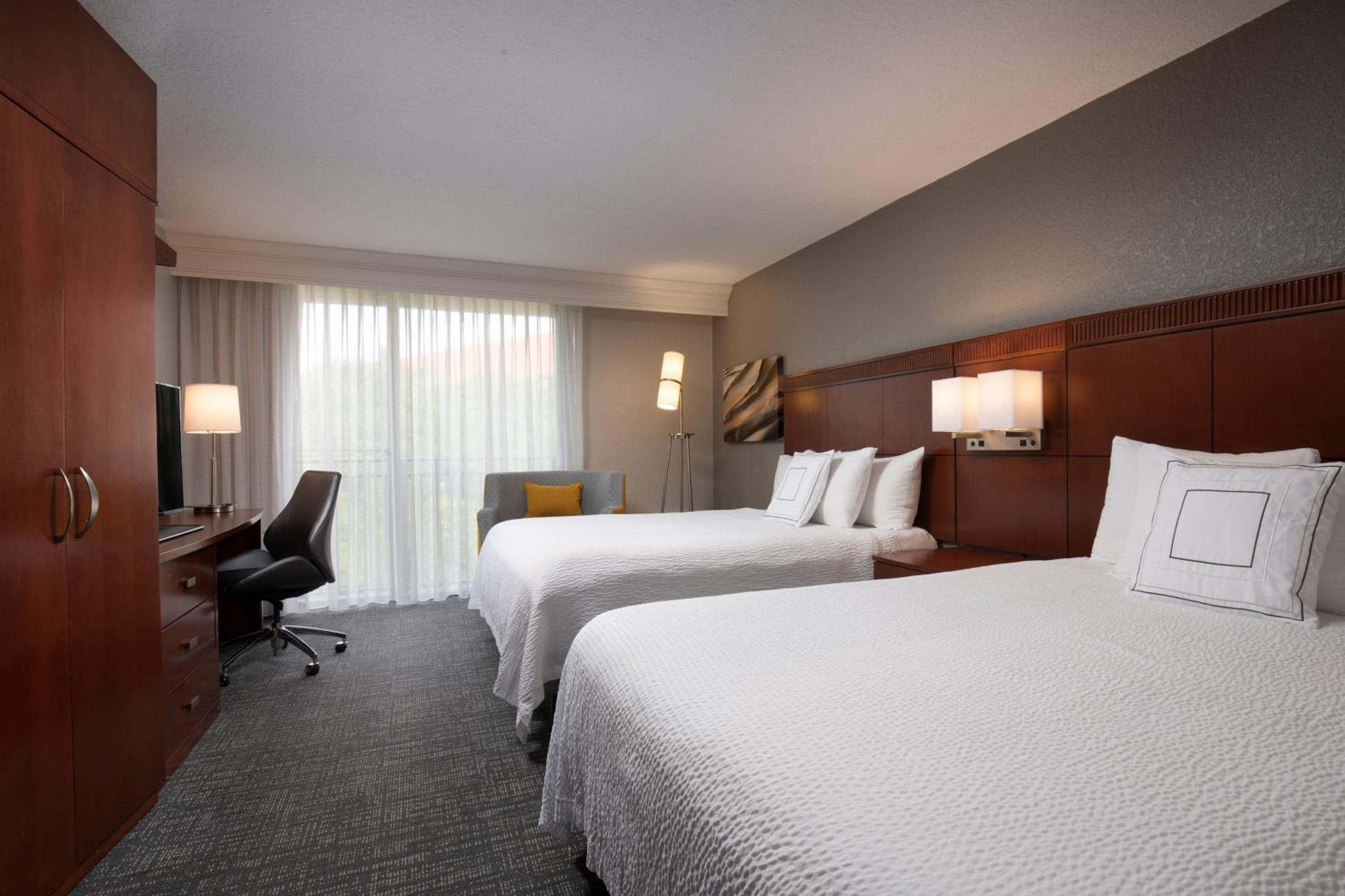 Queen Room with Two Queen Beds - Photo 1