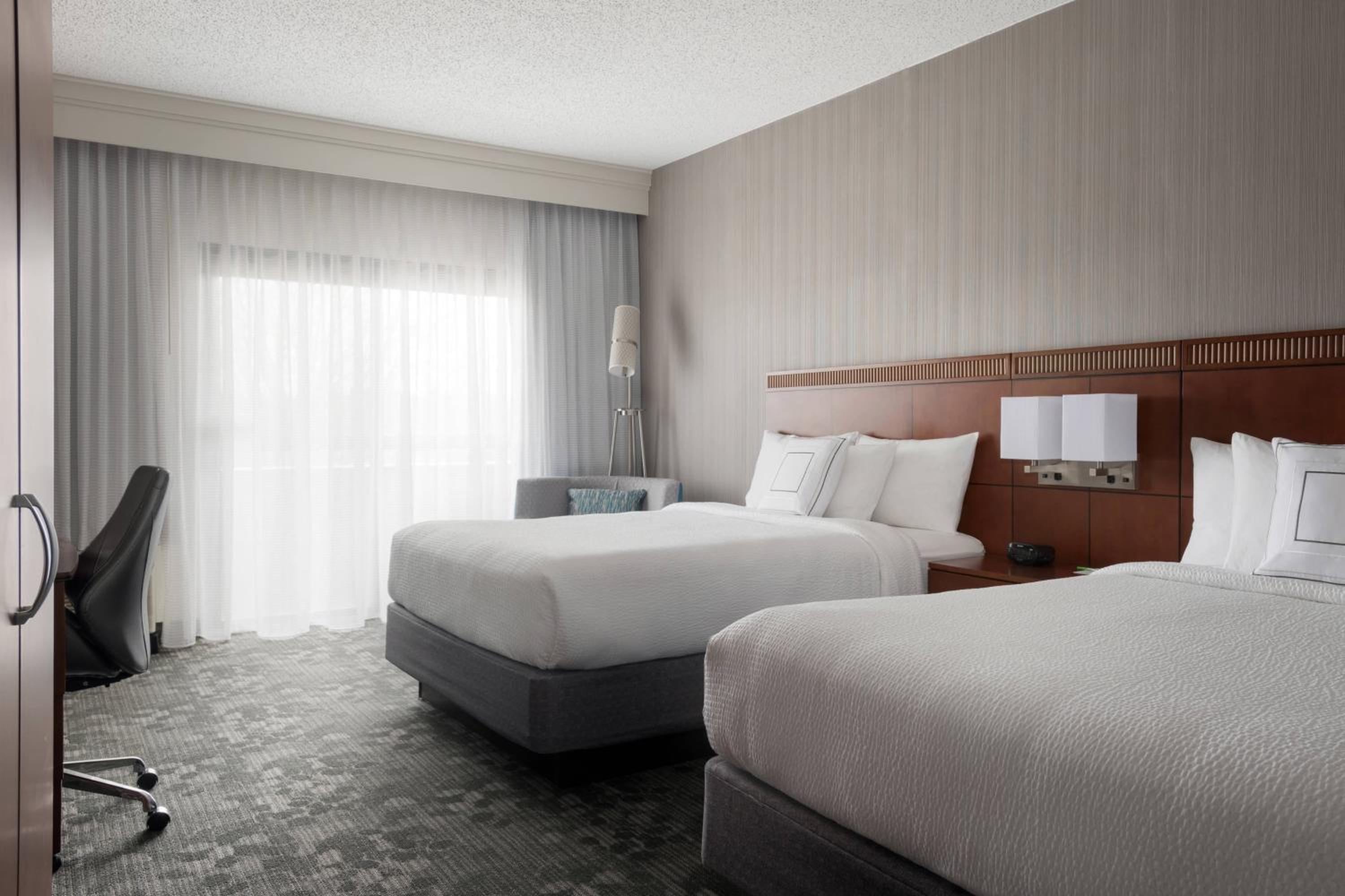 Queen Room with Two Queen Beds - Photo 1