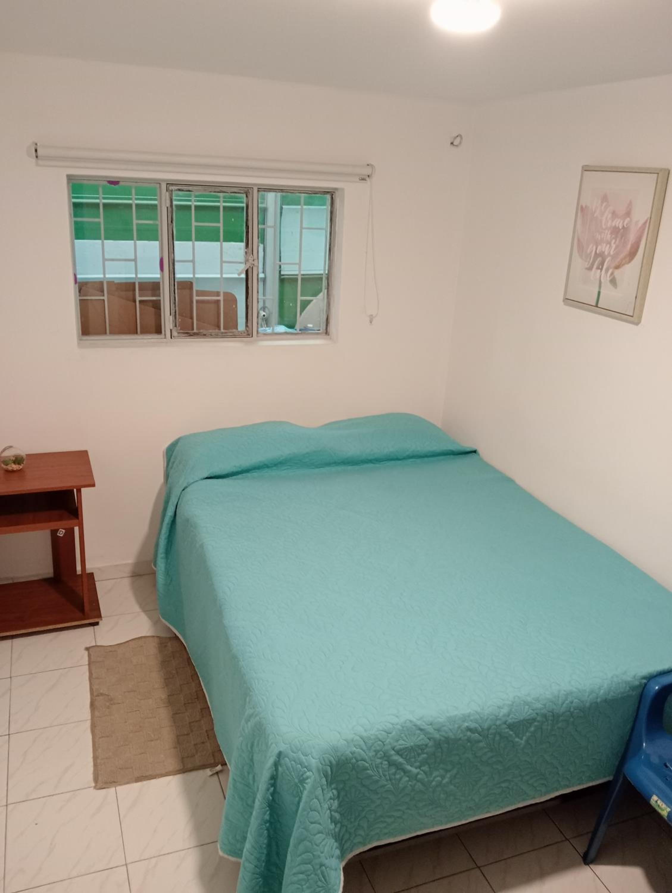 Basic Triple Room with Shared Bathroom photo 1