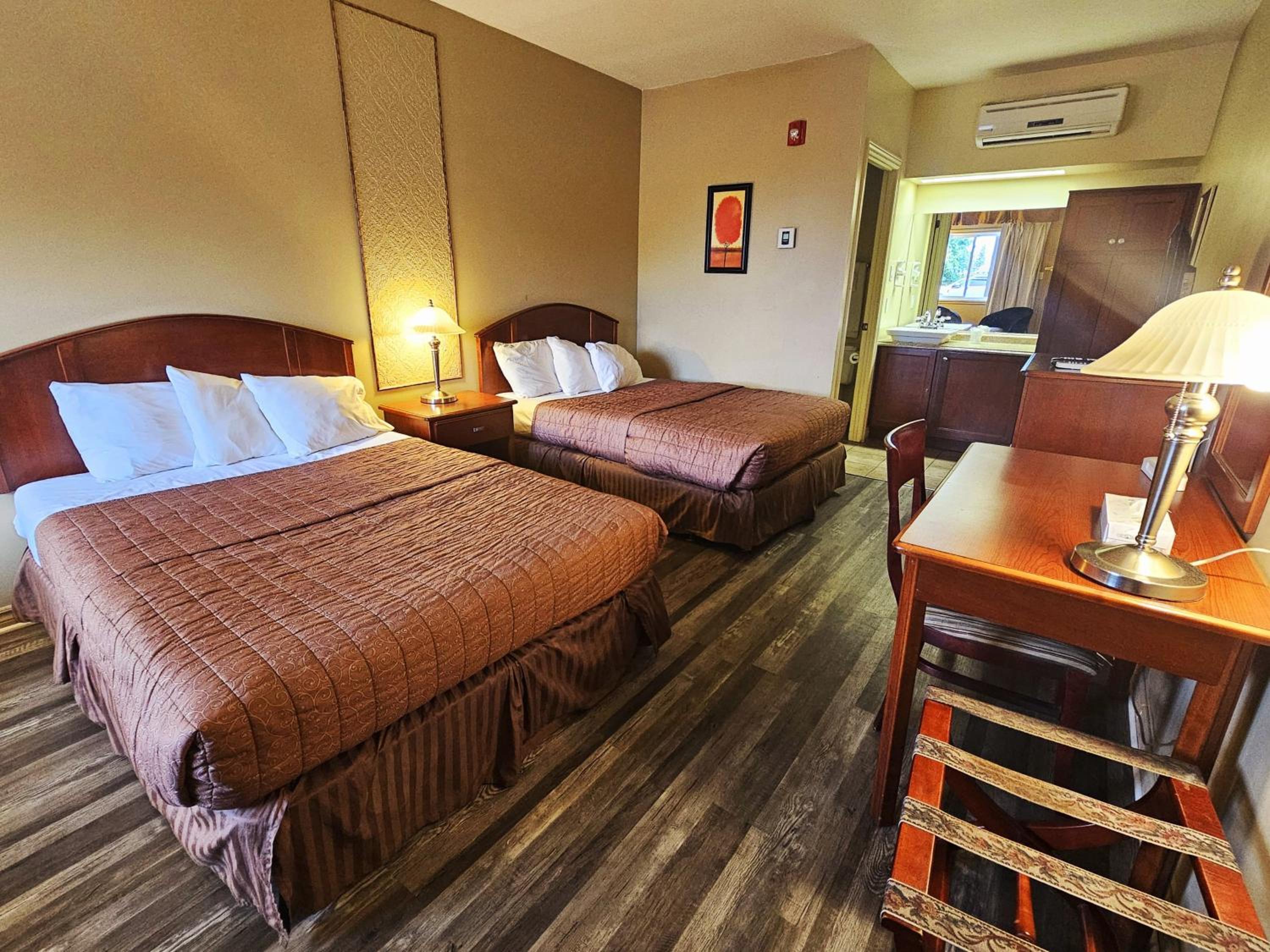 Classic Queen Room with Two Queen Beds - Photo 1
