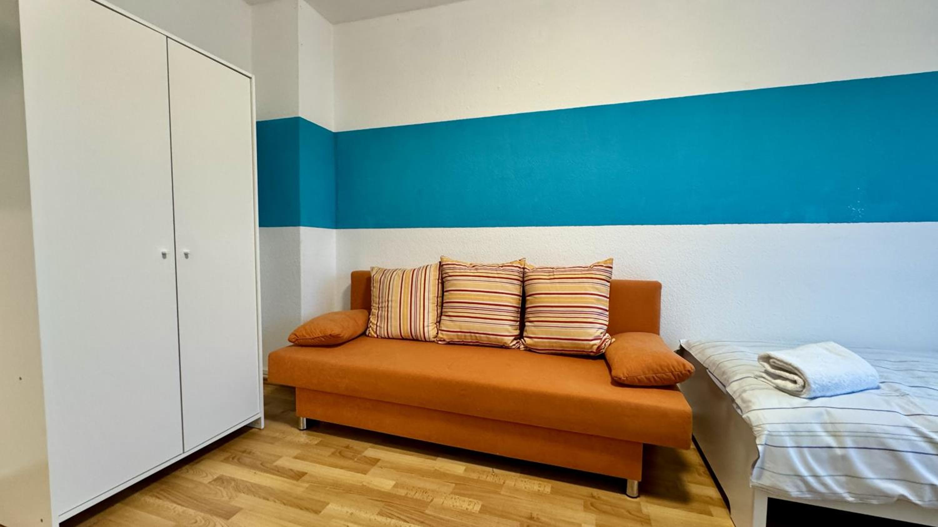 Three-Bedroom Apartment with Balcony photo 2