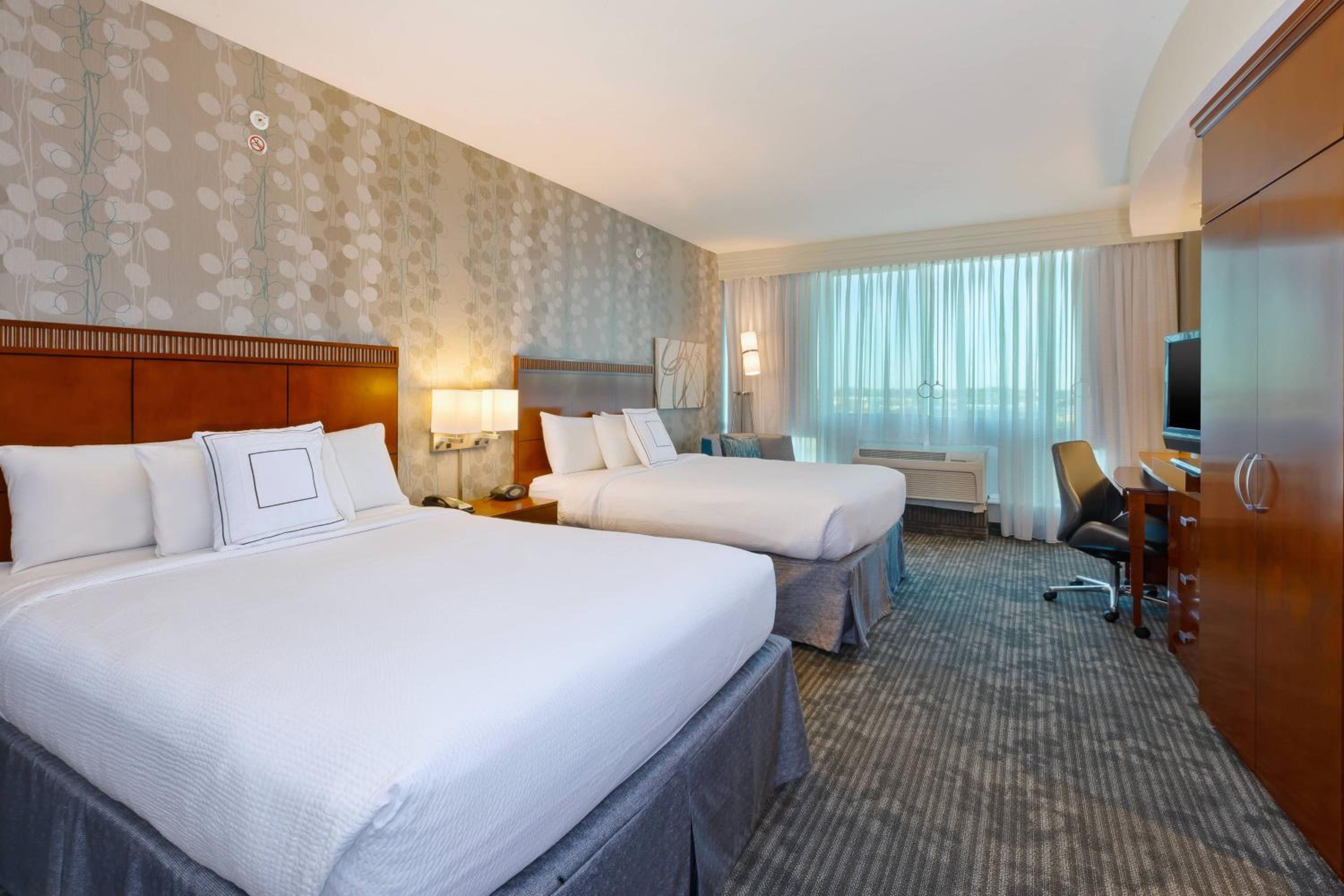 Queen Room with Two Queen Beds - Photo 1