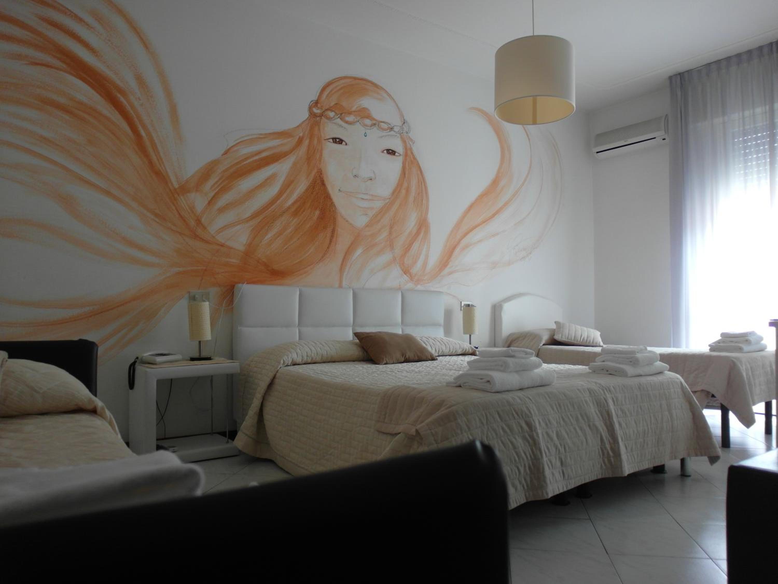 Quadruple Room with Balcony photo 2
