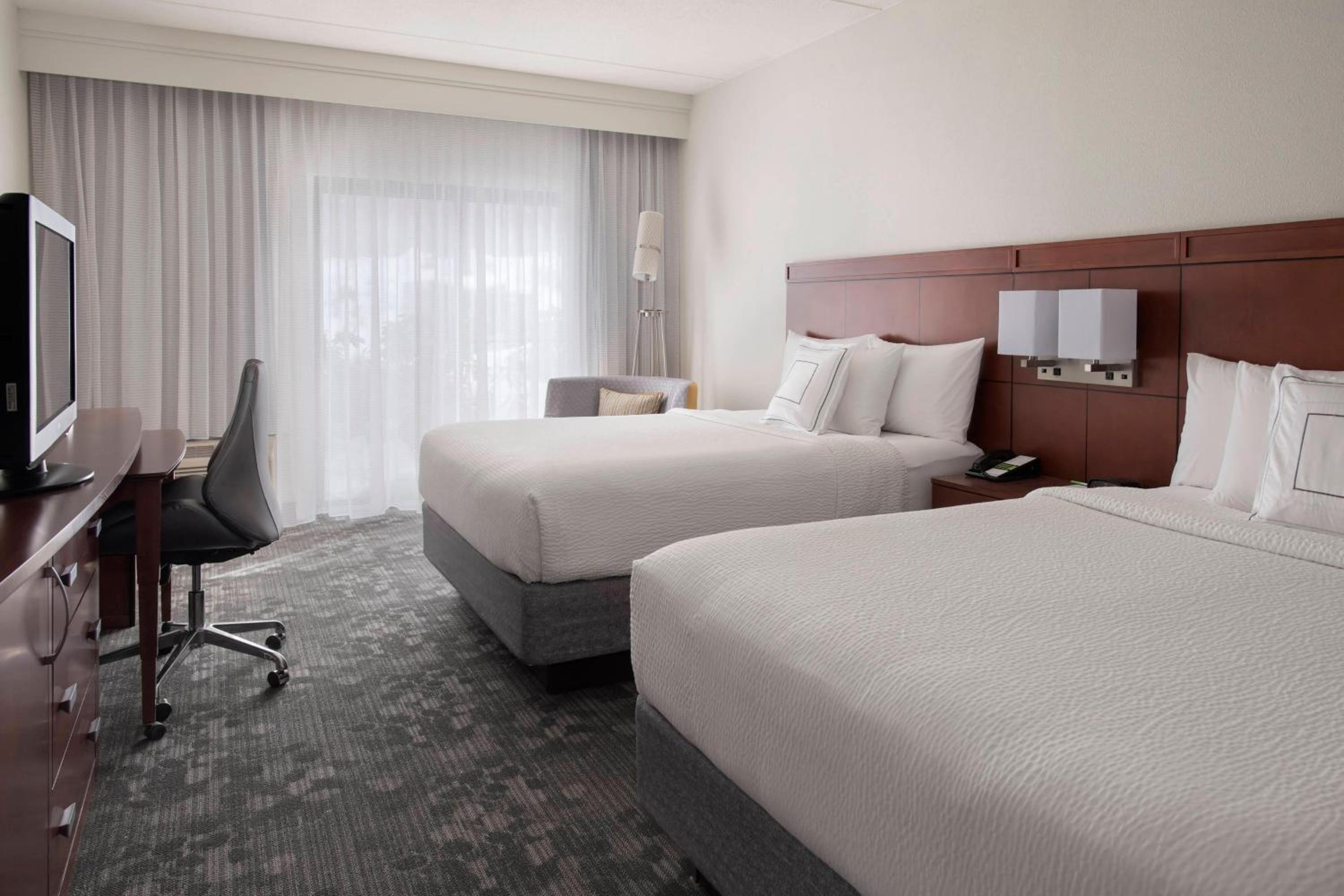 Queen Room with Two Queen Beds - Photo 1