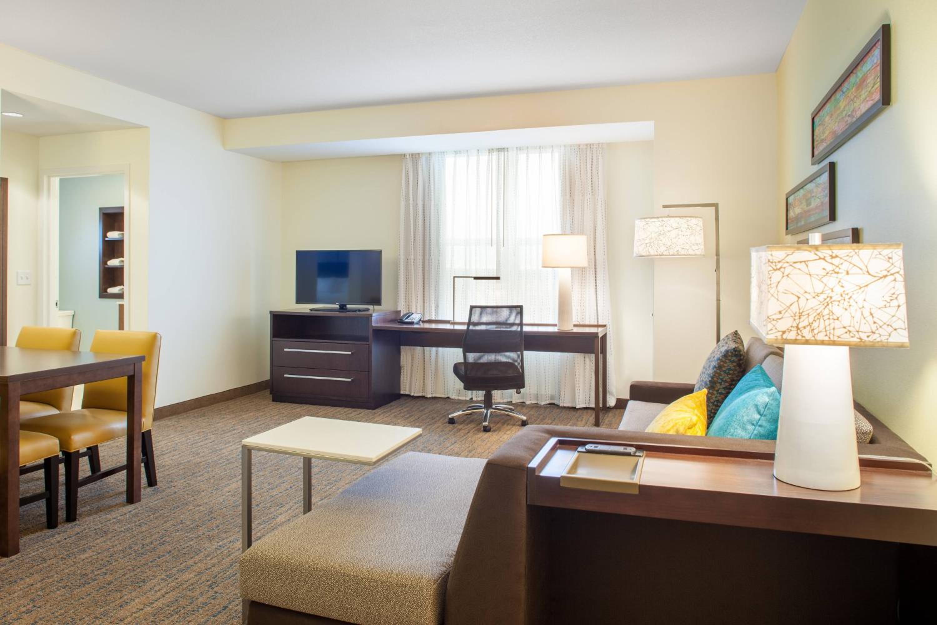 One-Bedroom King Suite with Sofa Bed and Roll-in Shower - Mobility and Hearing Accessible