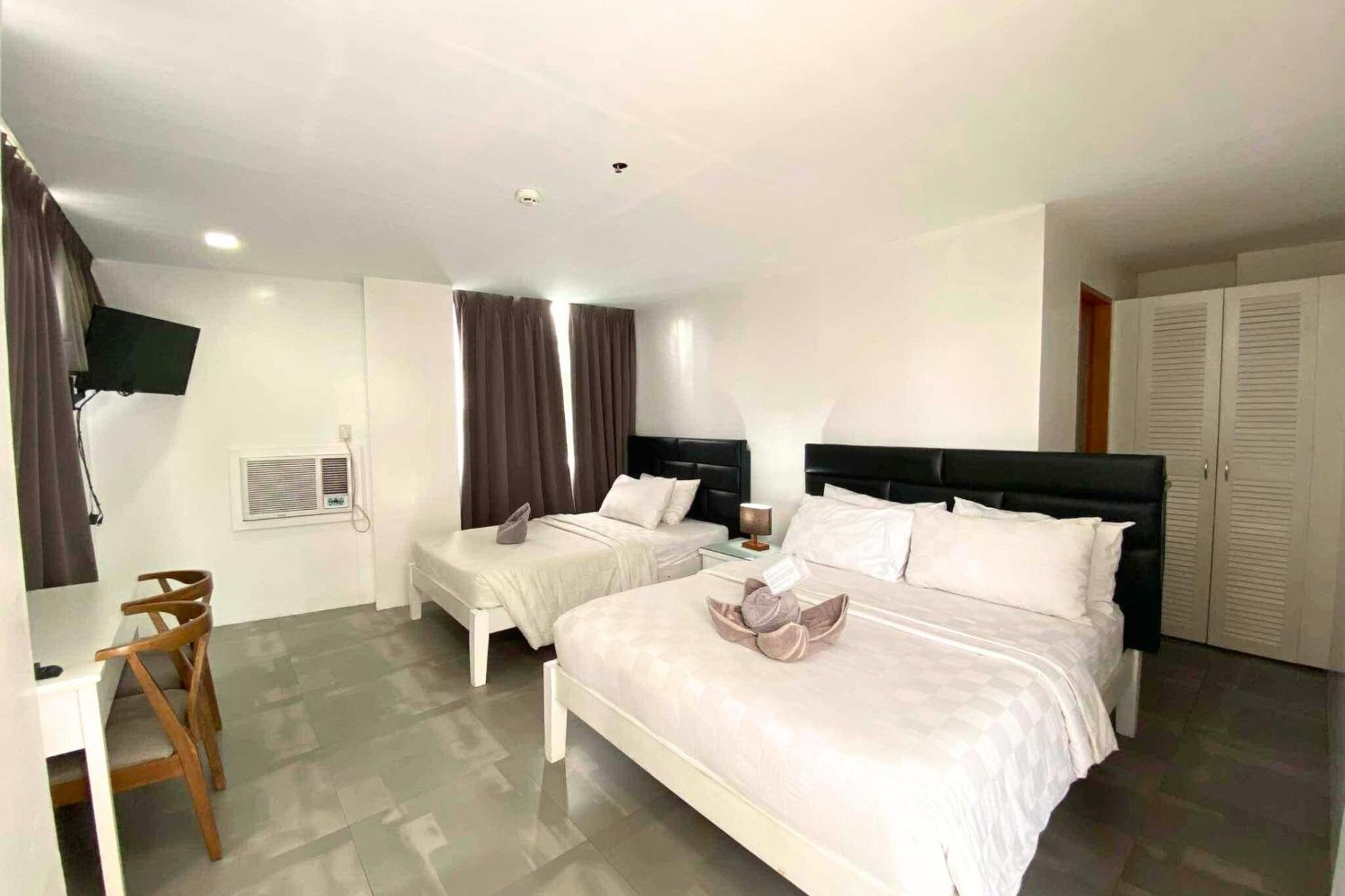 Deluxe Triple Room - Photo 1