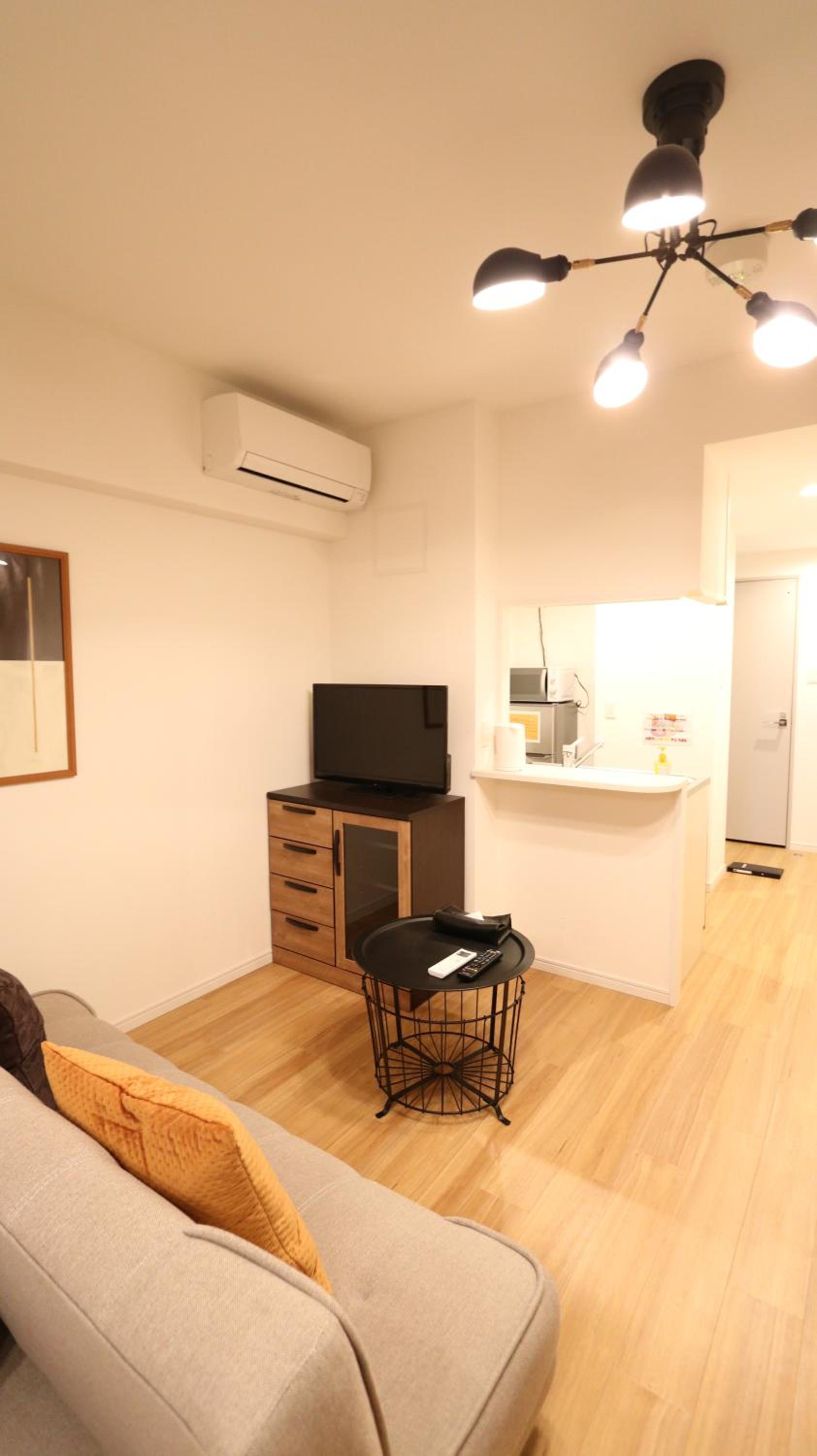 Deluxe Room with Kitchen (2 Double Beds and 1 Sofa Bed) - Non-Smoking - Photo 12