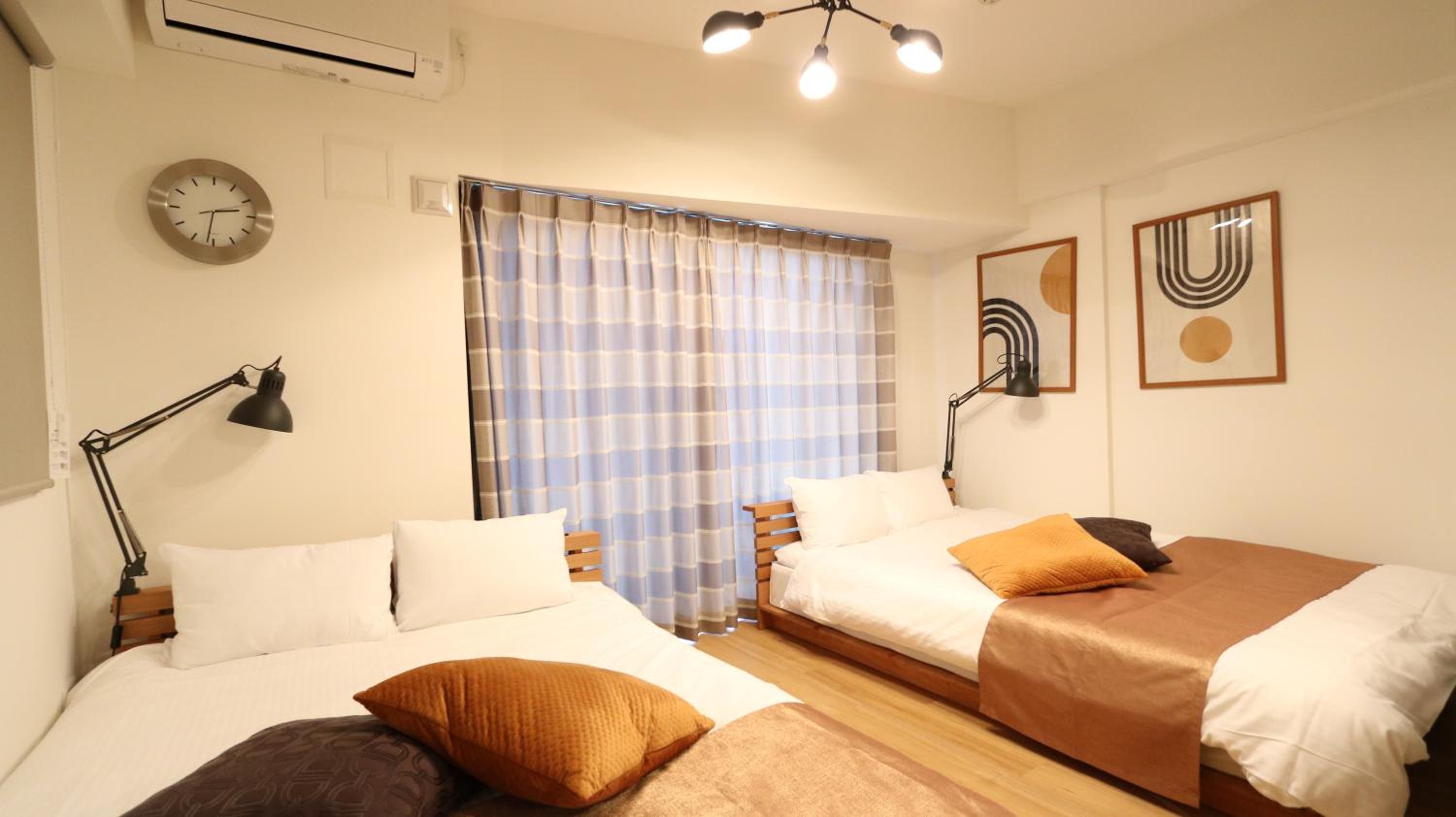Deluxe Room with Kitchen (2 Double Beds and 1 Sofa Bed) - Non-Smoking - Photo 1
