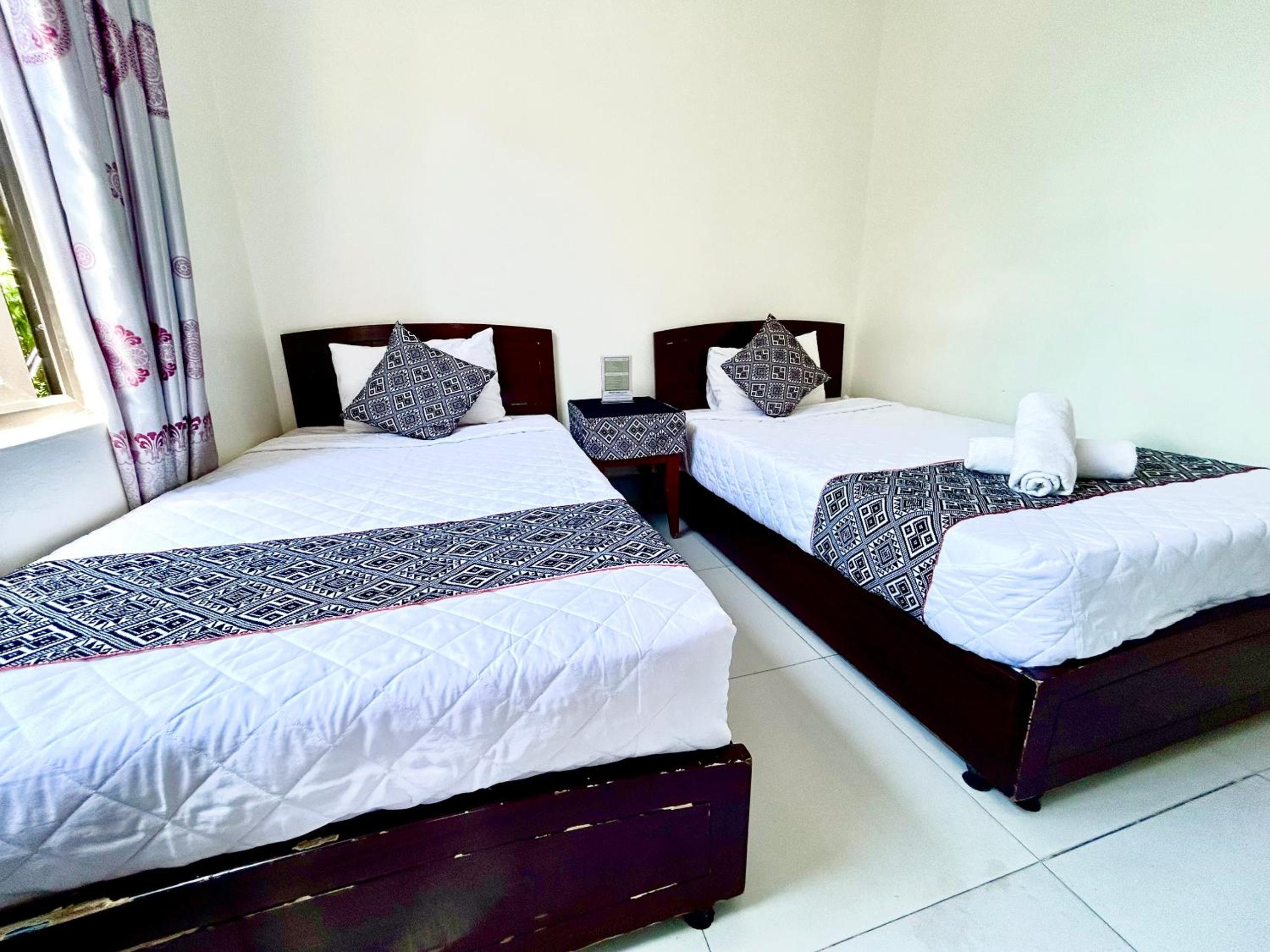 Standard Twin Room - Photo 1
