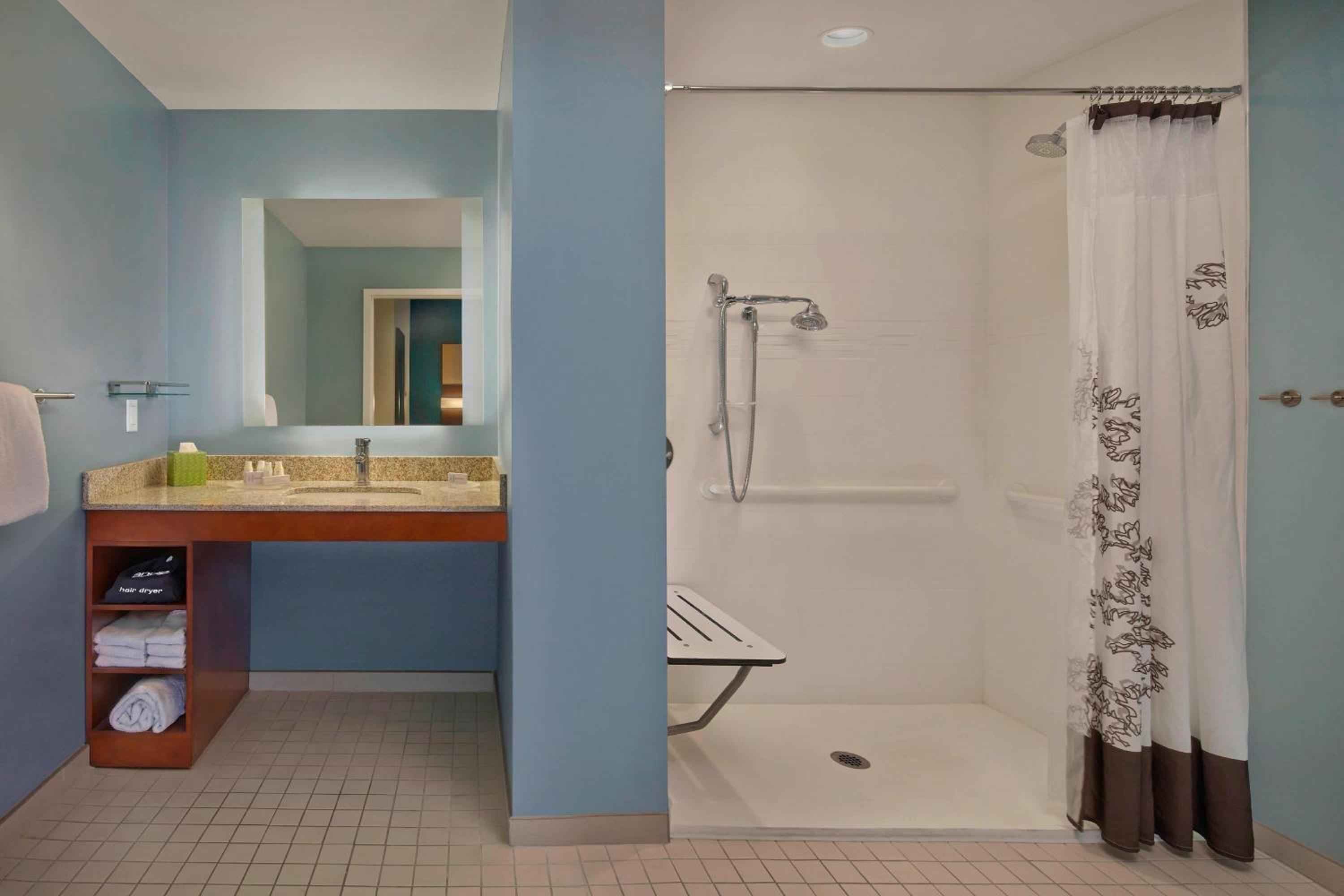 One-Bedroom King Suite with Sofa Bed and Roll-in Shower - Mobility and Hearing Accessible