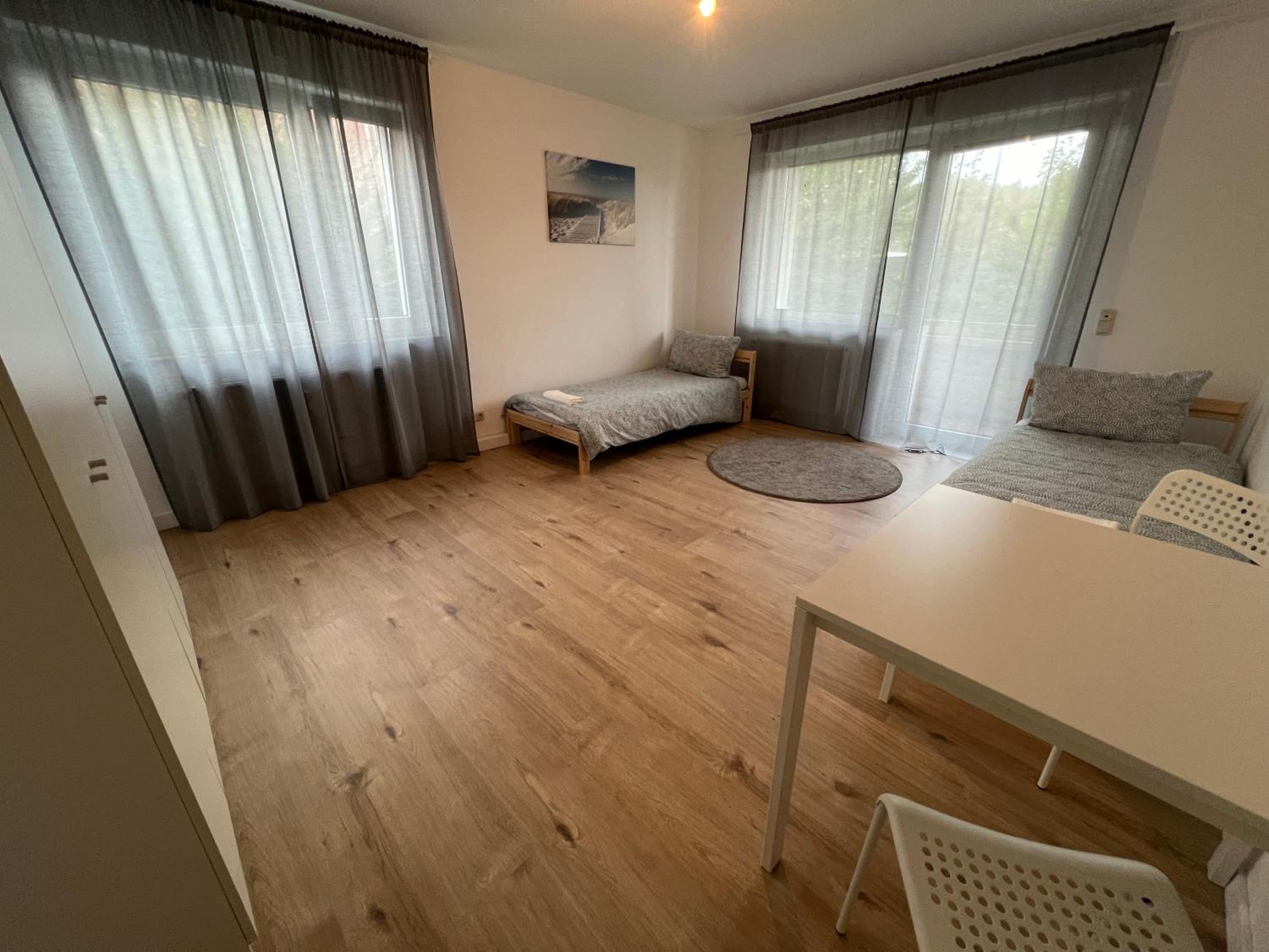 Three-Bedroom Apartment photo 1