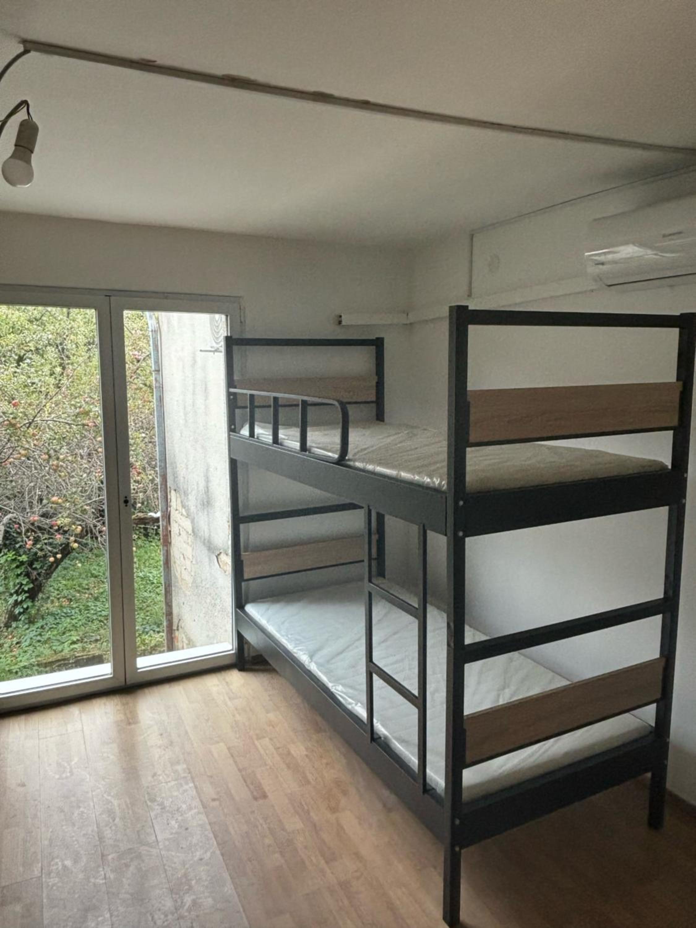 Single Bed In Mixed Dormitory Room