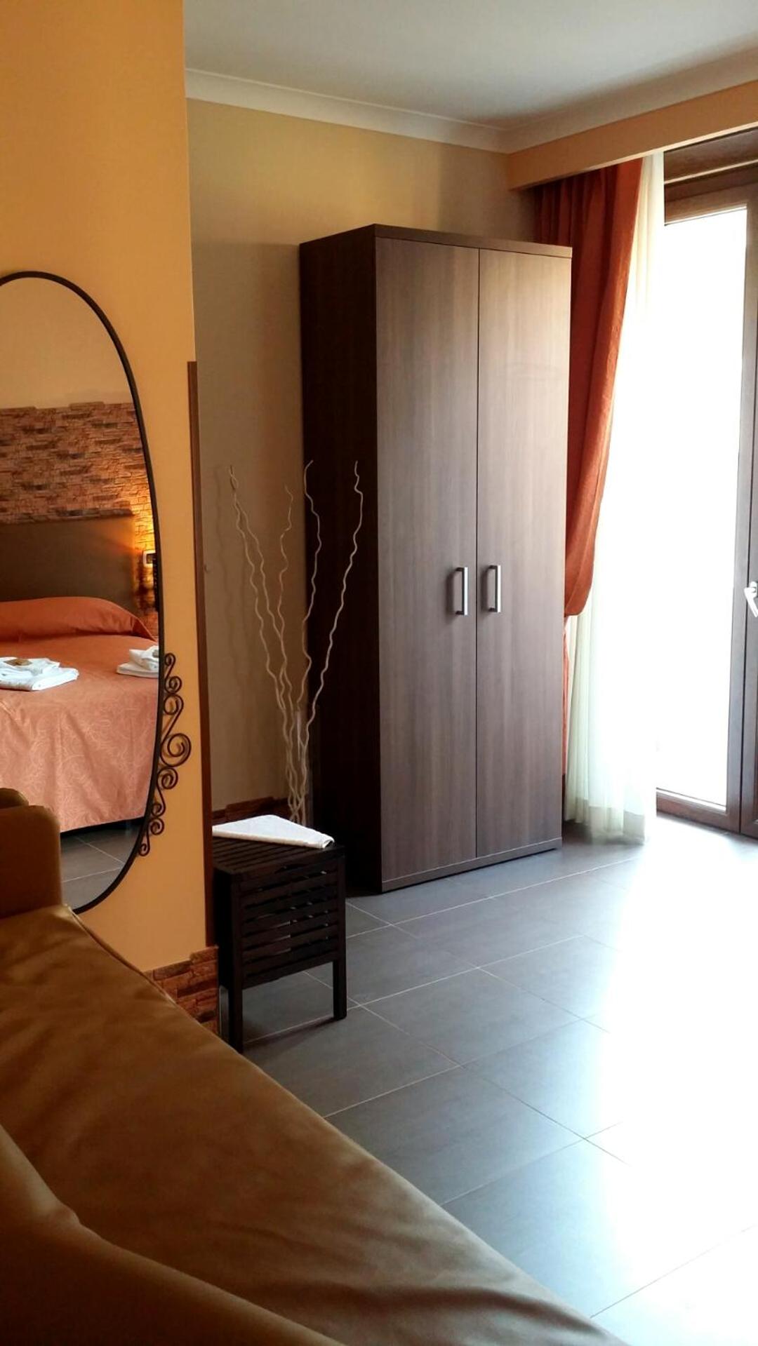 Quadruple Room with Balcony photo 2