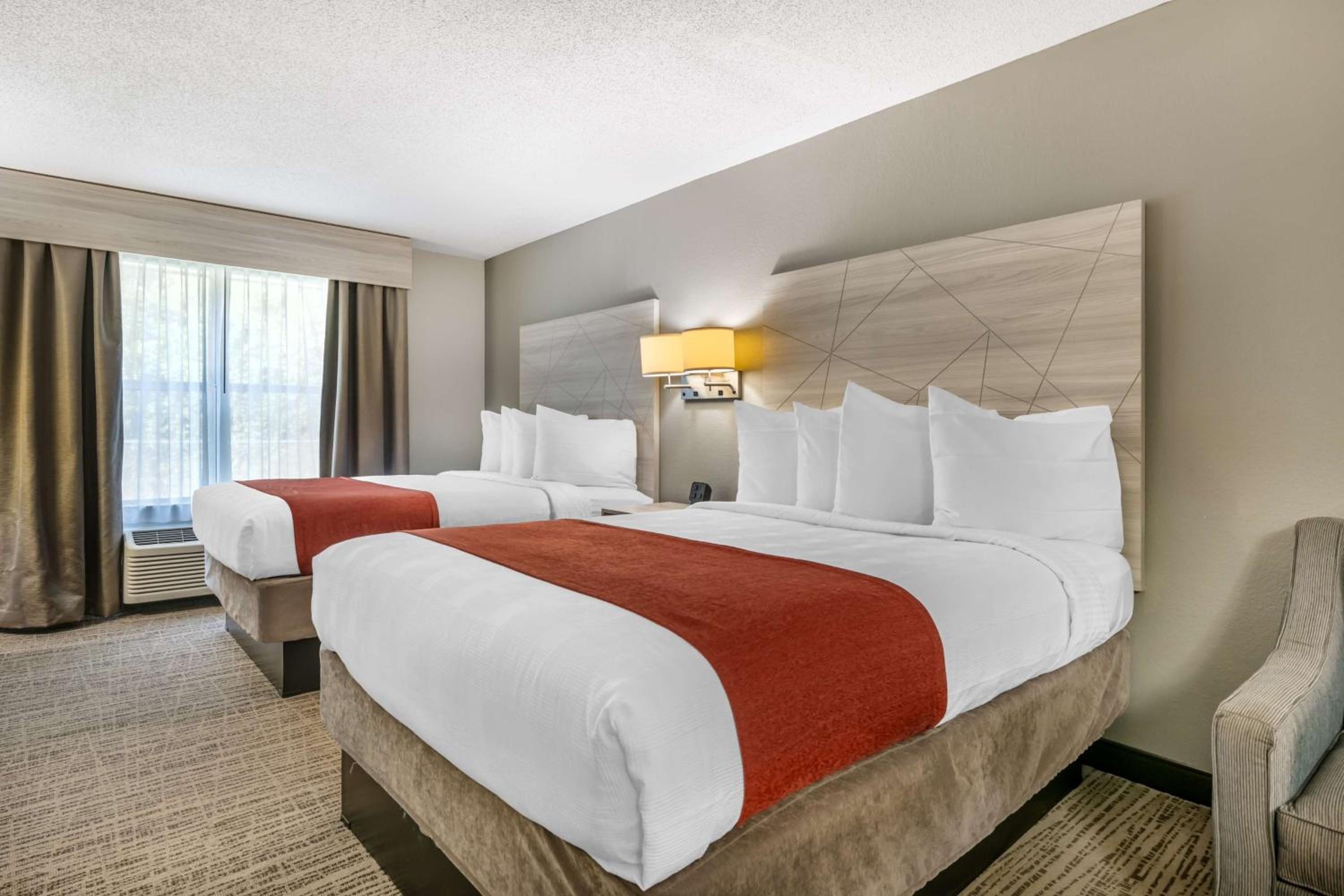 Queen Room with Two Queen Beds and Sofa Bed - Photo 1