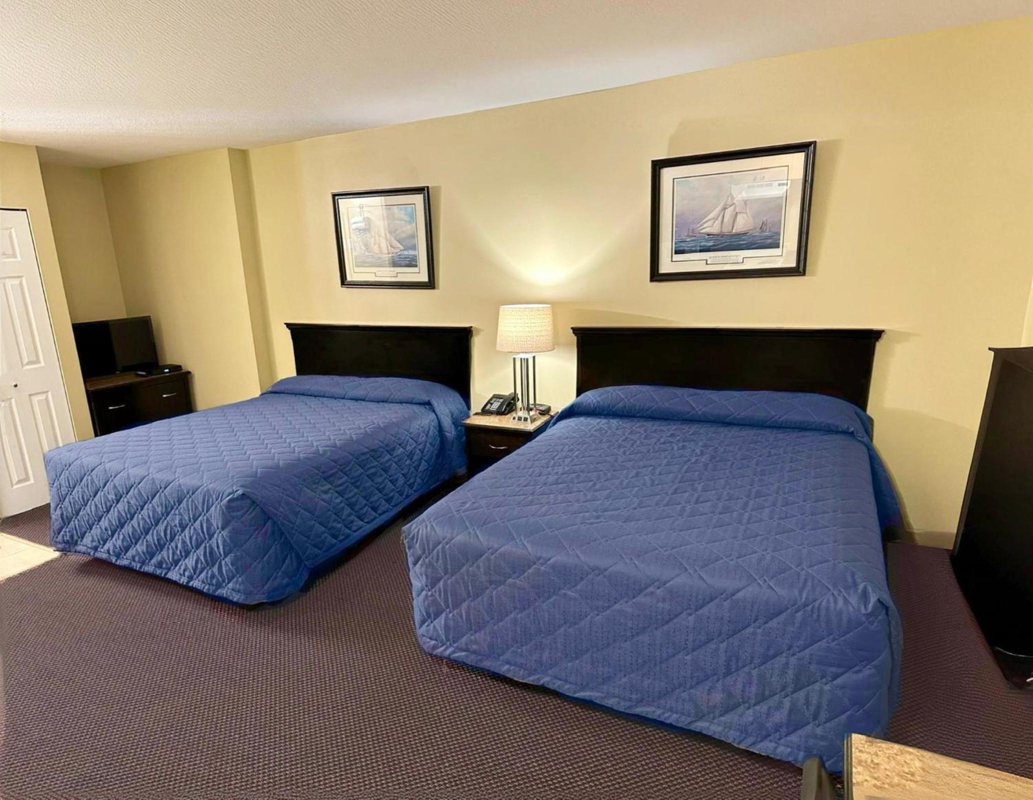 Queen Room with Two Queen Beds - Photo 1
