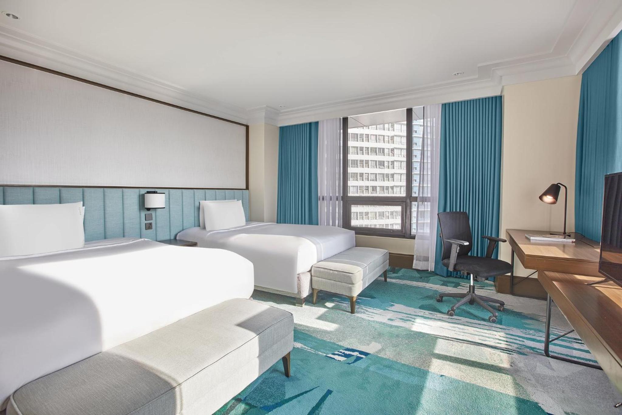 Premium Room with Two King Beds - Photo 1