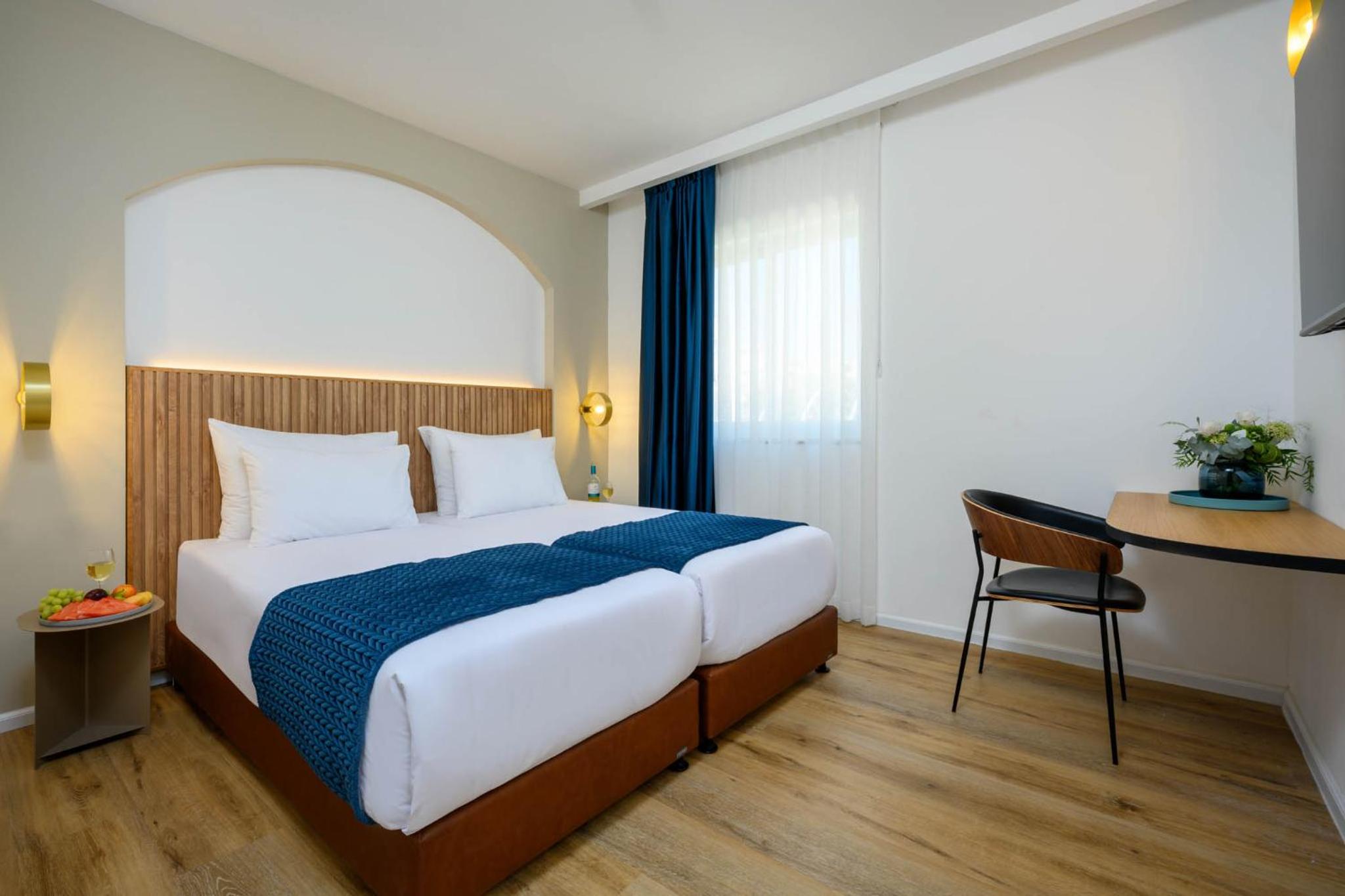 New Deluxe Room - Photo 1