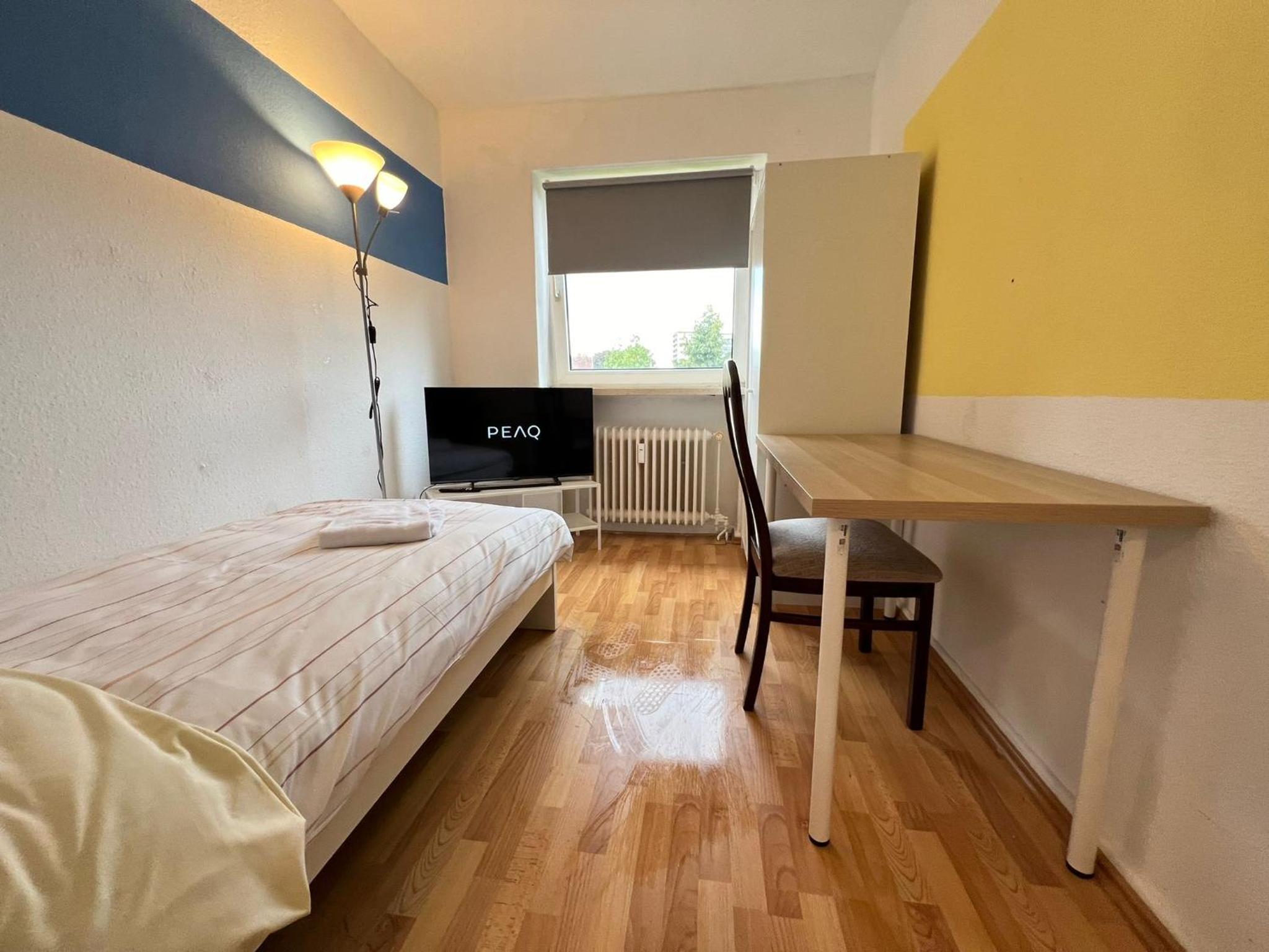 Three-Bedroom Apartment with Balcony photo 1