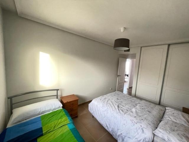 Apartamento de dos habitaciones con balcón y terraza