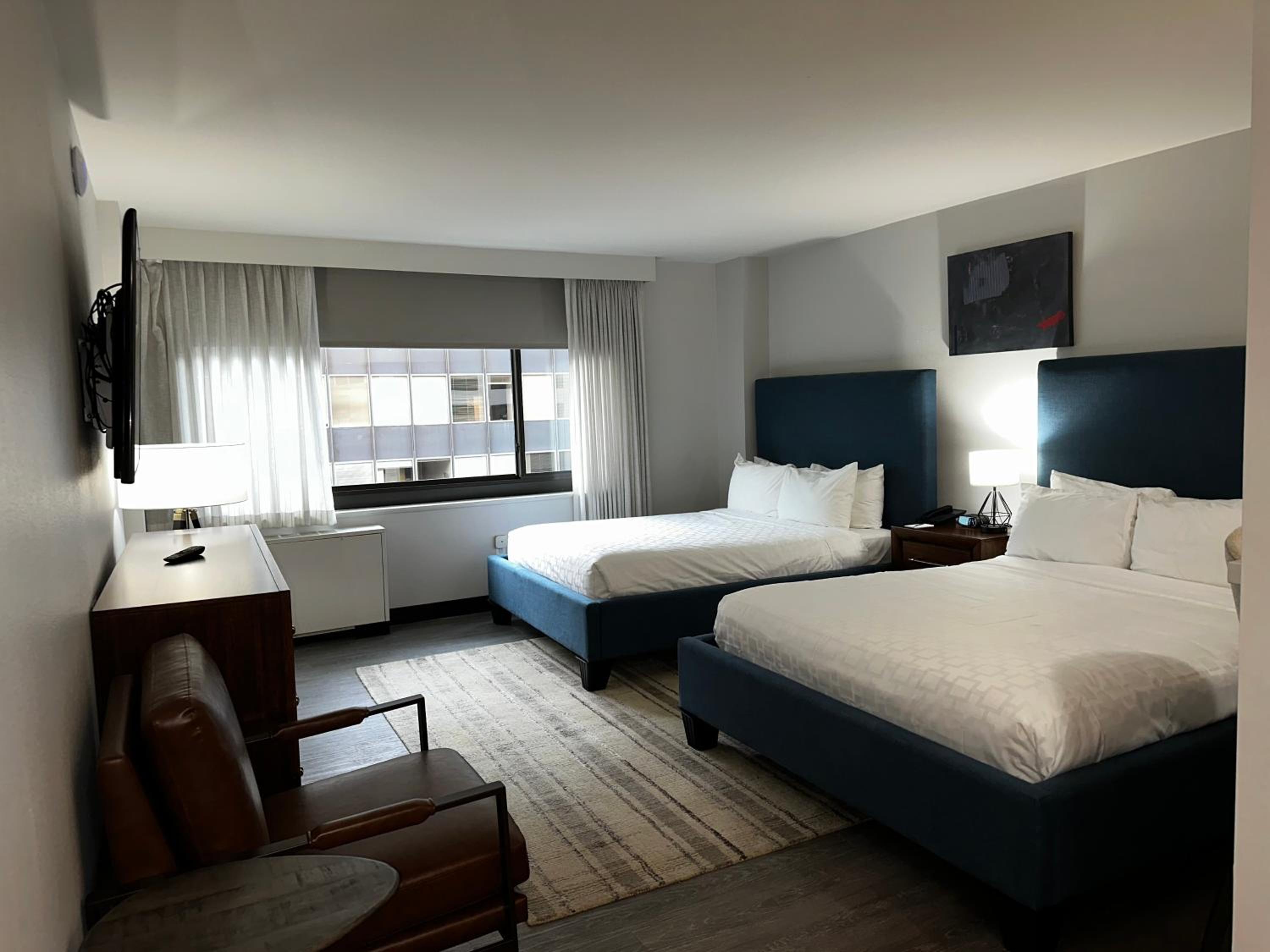 Quadruple Room with Two Queen Beds - Disability Access/Non Smoking photo 3