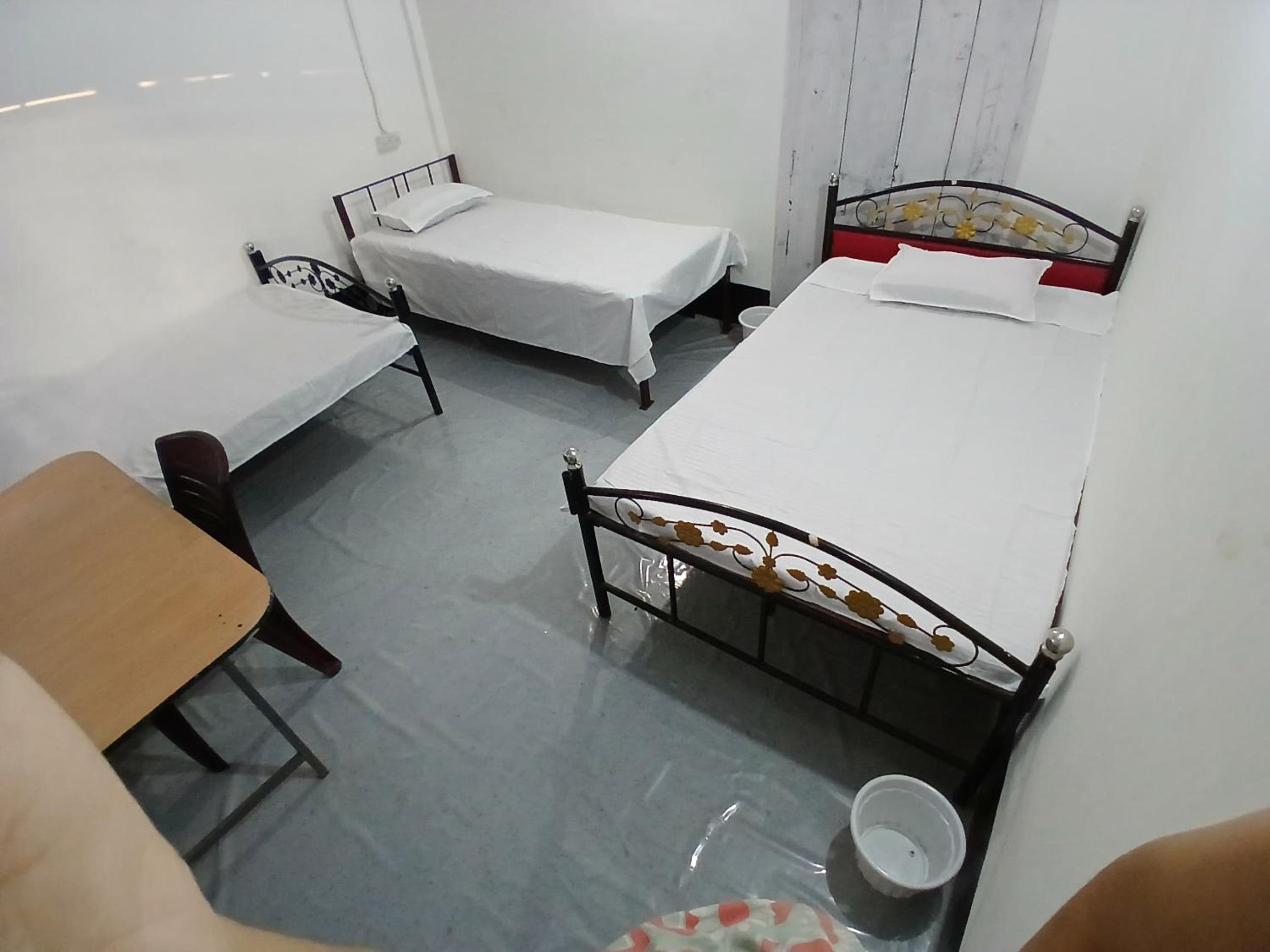 Bed In Male Dormitory Room photo 1