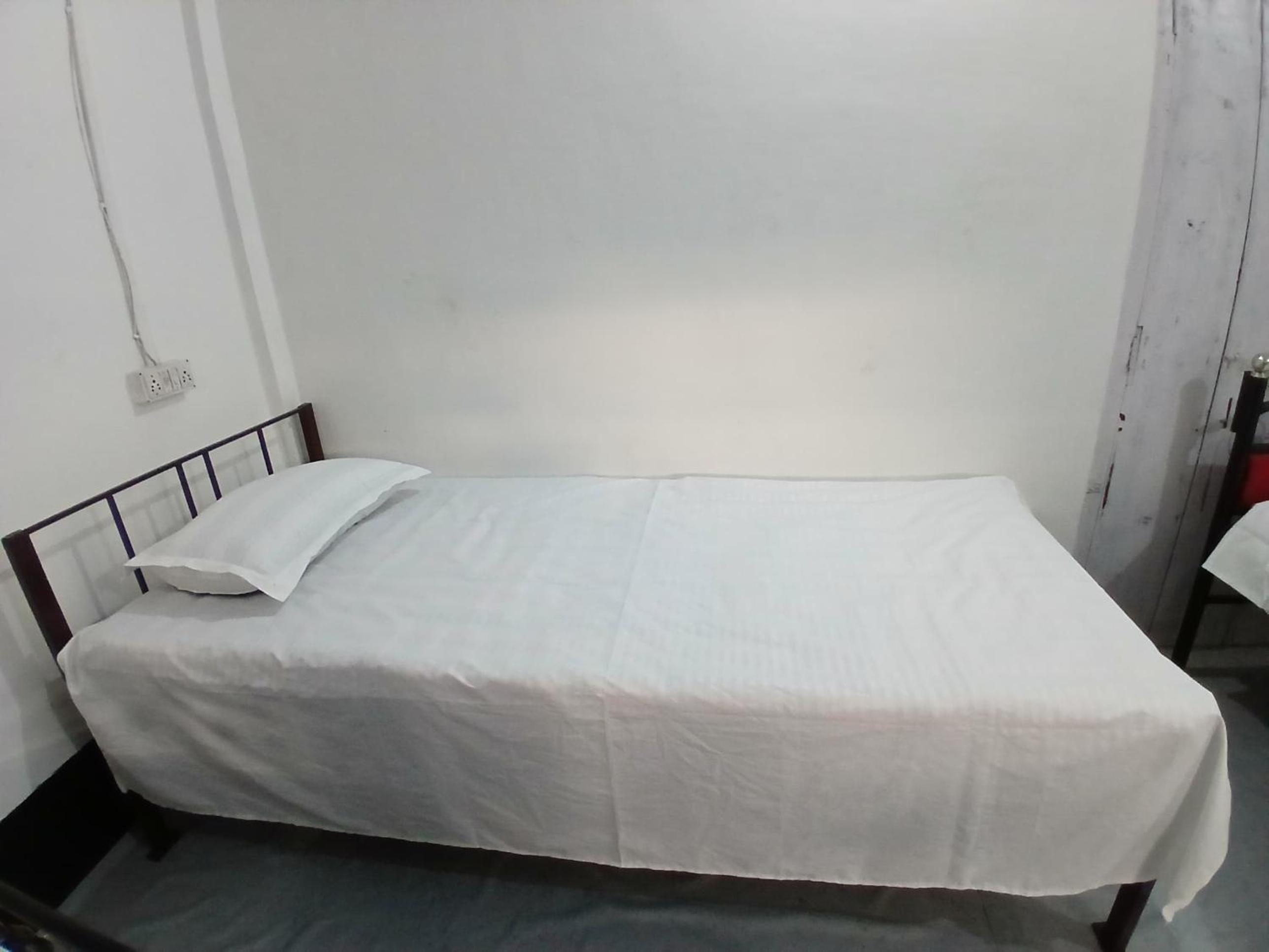 Bed In Male Dormitory Room photo 3