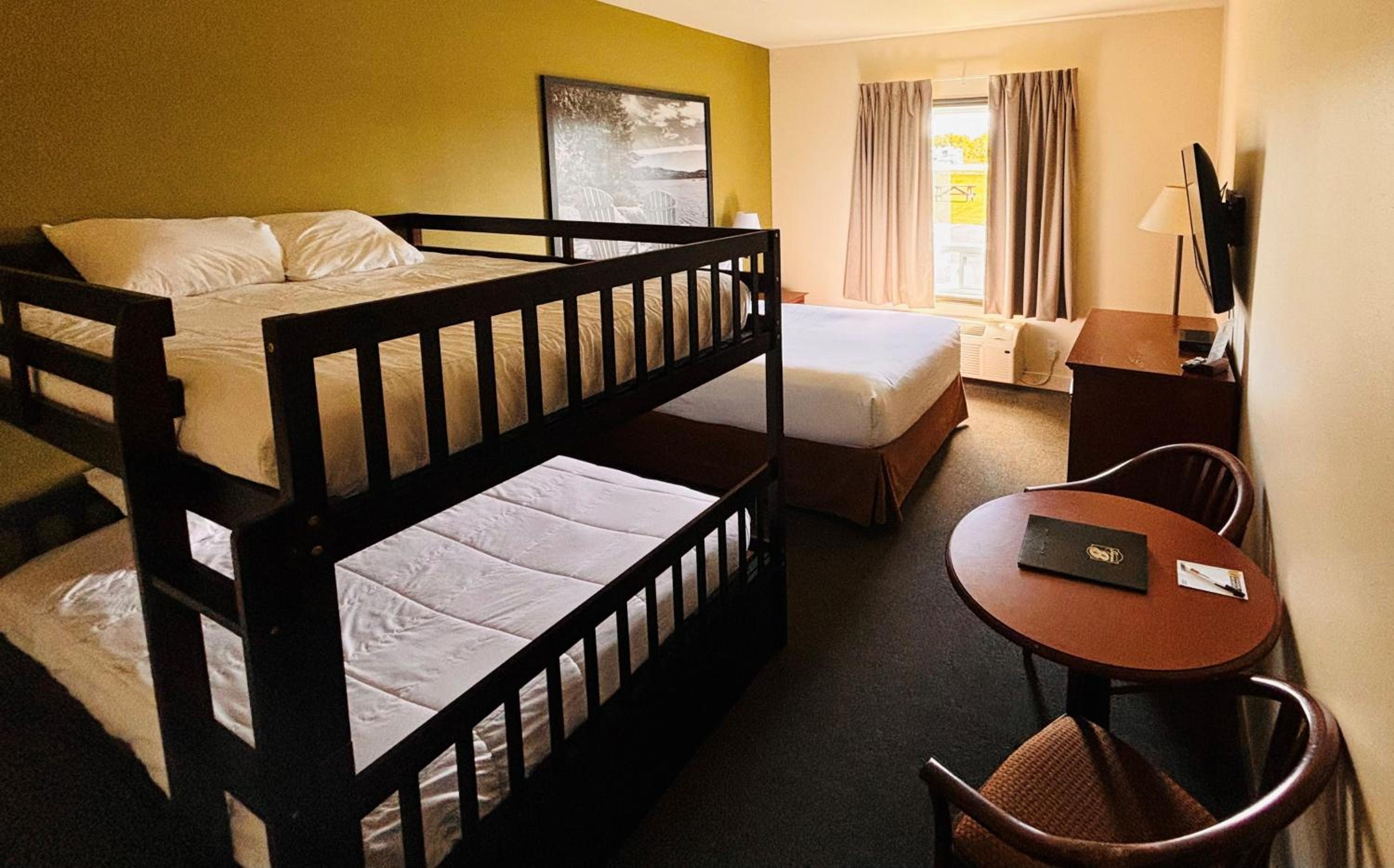 Efficiency Room with One Queen Bed and One Double Bunk Bed - Non-Smoking - Photo 2