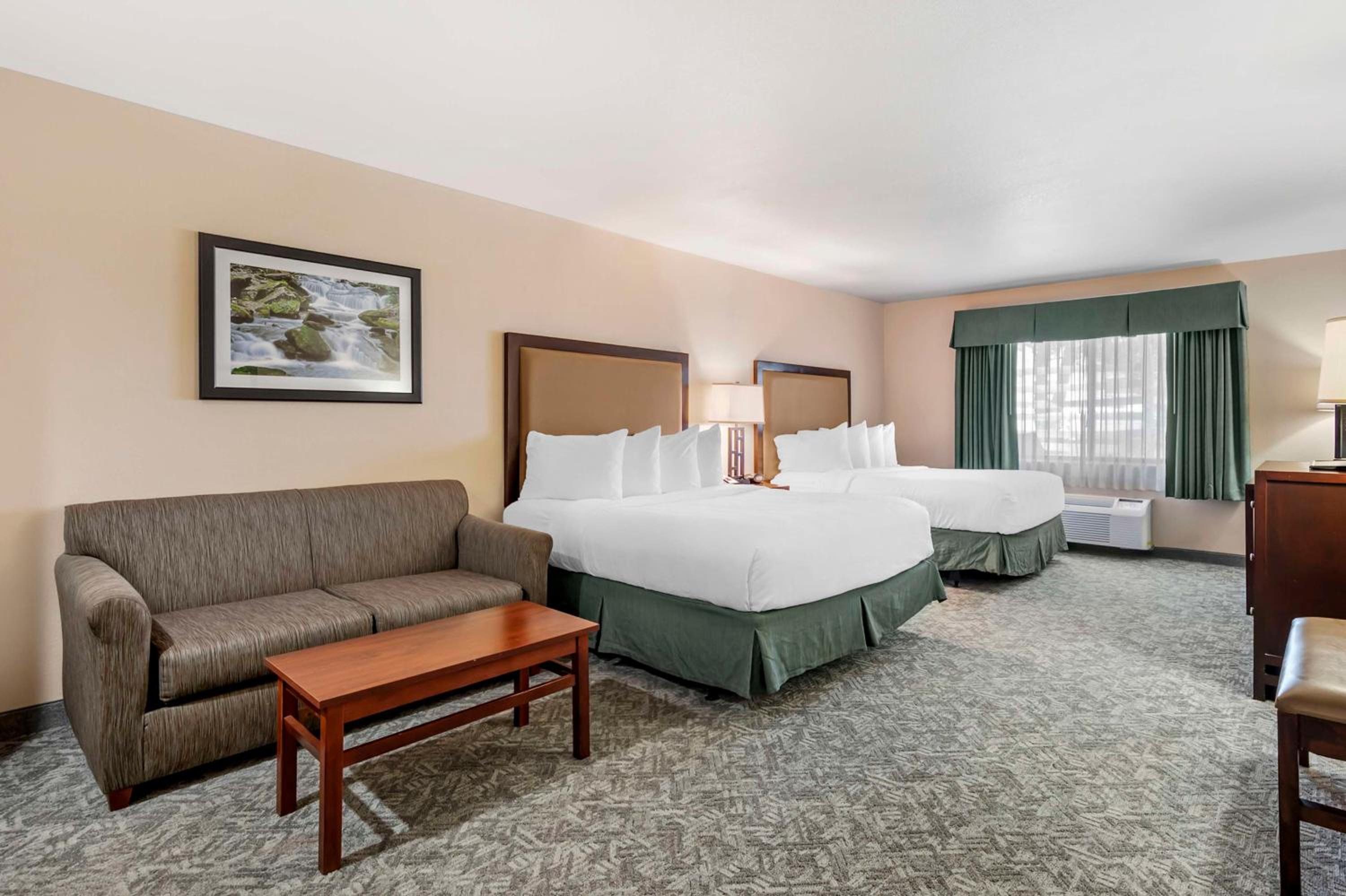 Queen Room with Two Queen Beds and Mobility Accessible Bathtub - Photo 1