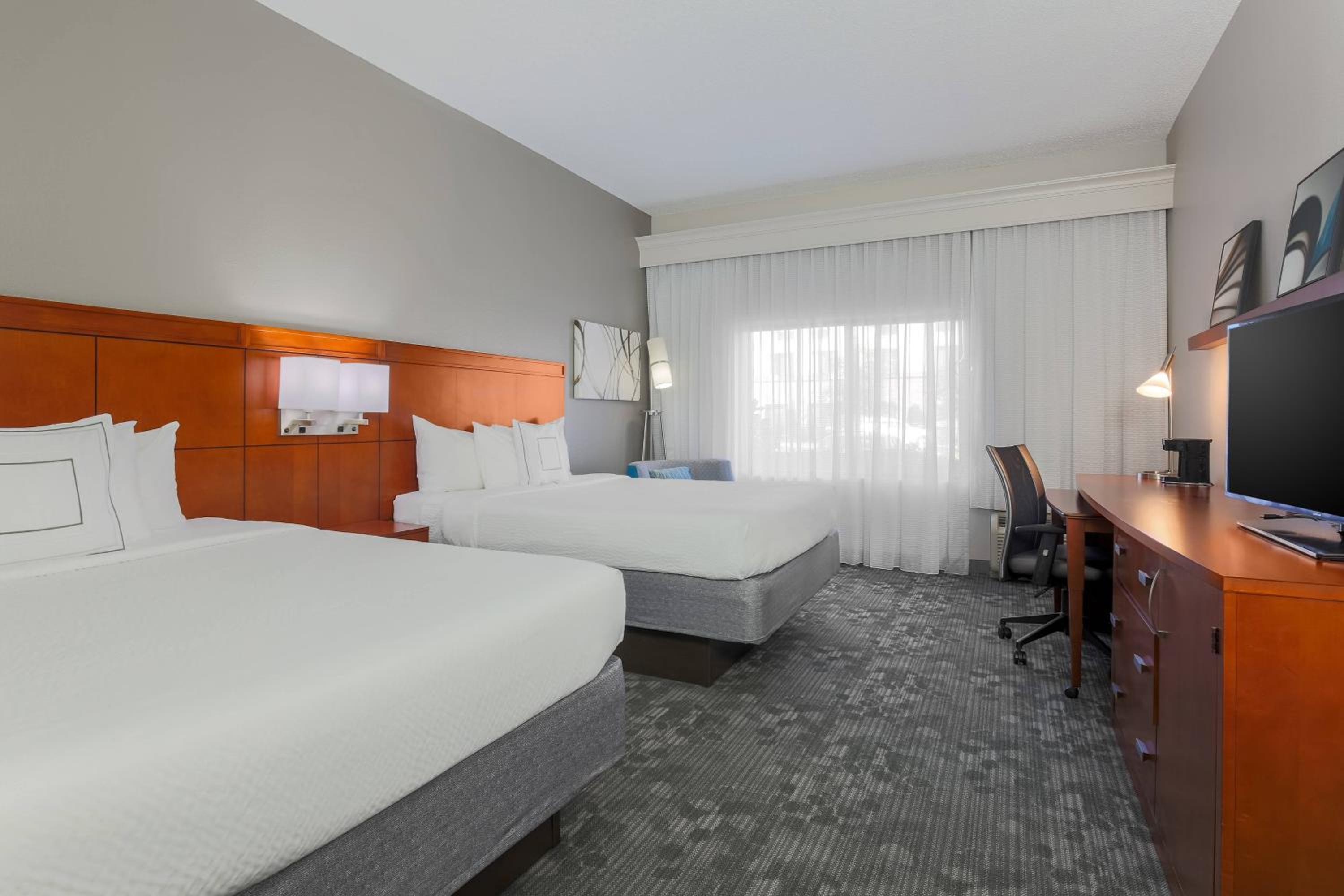 Queen Room with Two Queen Beds - Photo 1