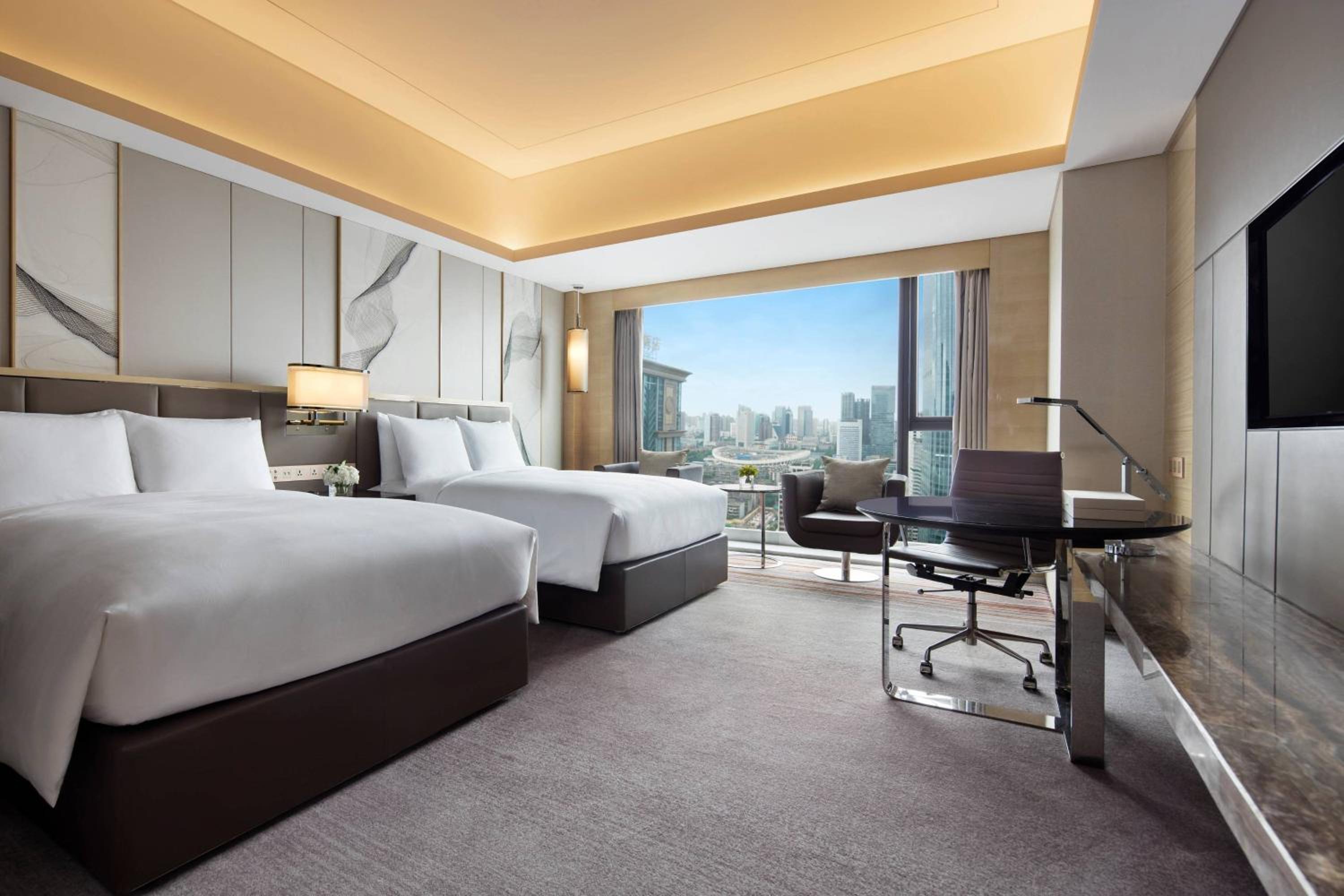 Executive guest room with two double beds