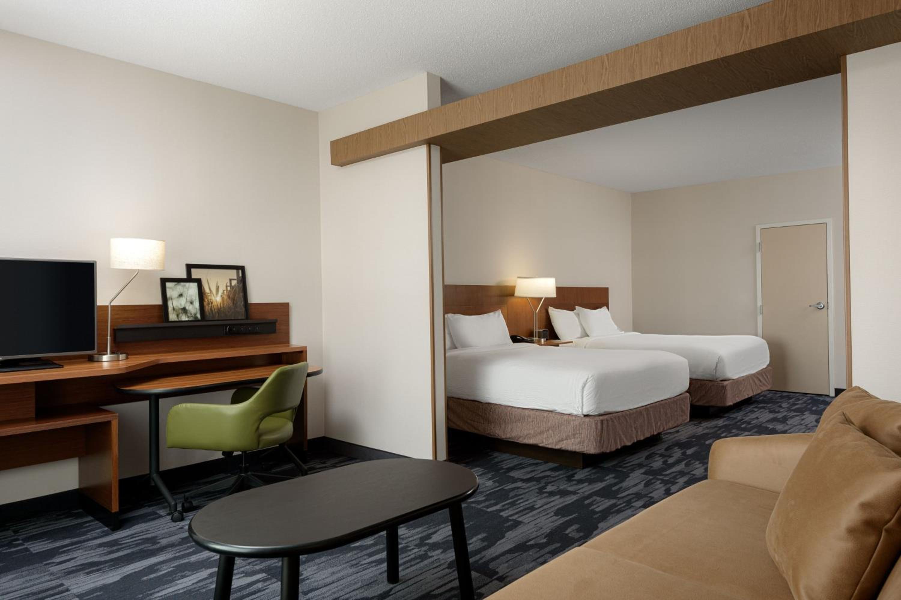 Queen Suite with Two Queen Beds and Sofa Bed photo 2