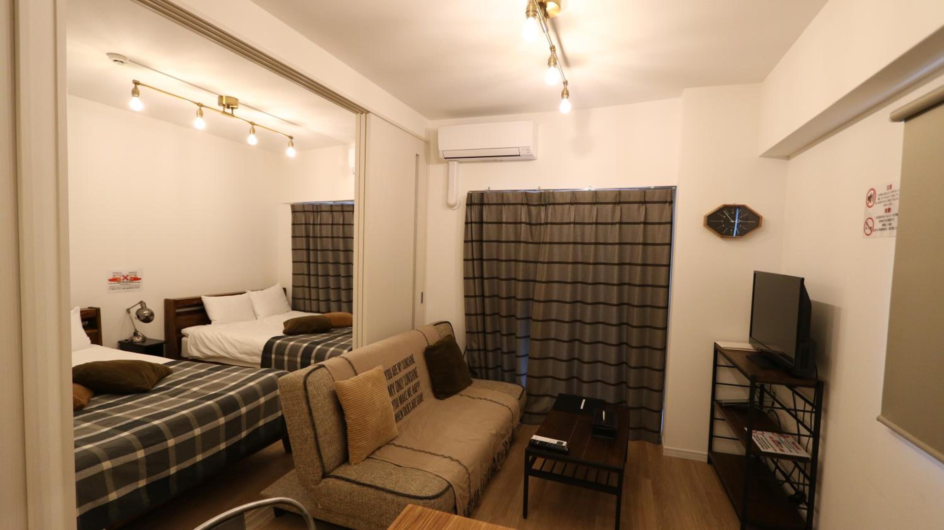 Deluxe Room with Kitchen (2 Double Beds and 1 Sofa Bed) - Non-Smoking - Photo 8