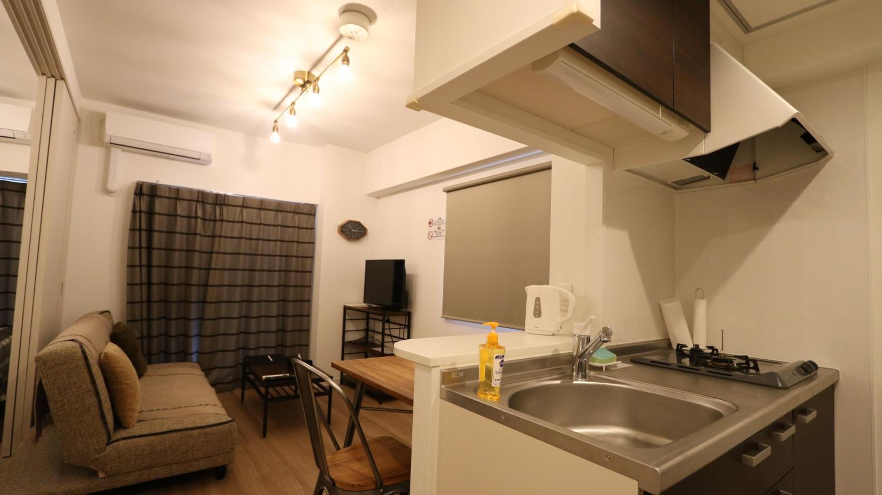 Deluxe Room with Kitchen (2 Double Beds and 1 Sofa Bed) - Non-Smoking - Photo 19