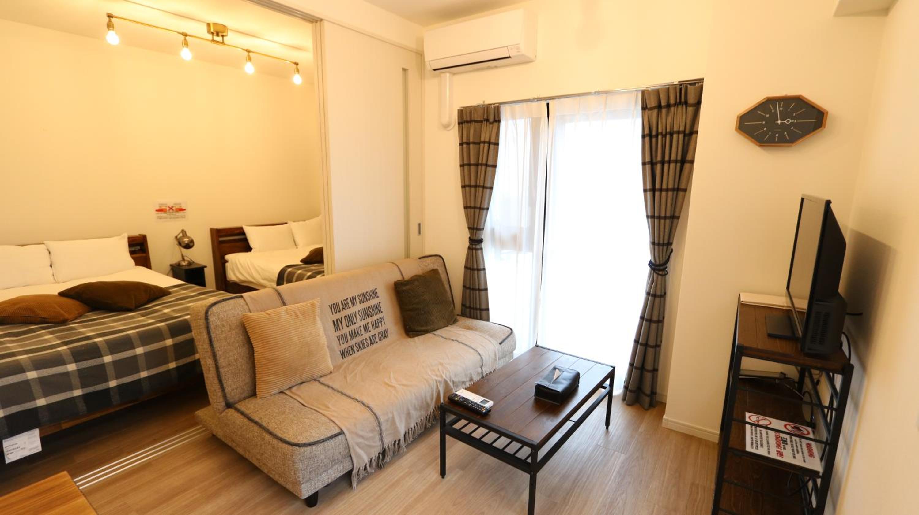 Deluxe Room with Kitchen (2 Double Beds and 1 Sofa Bed) - Non-Smoking - Photo 15