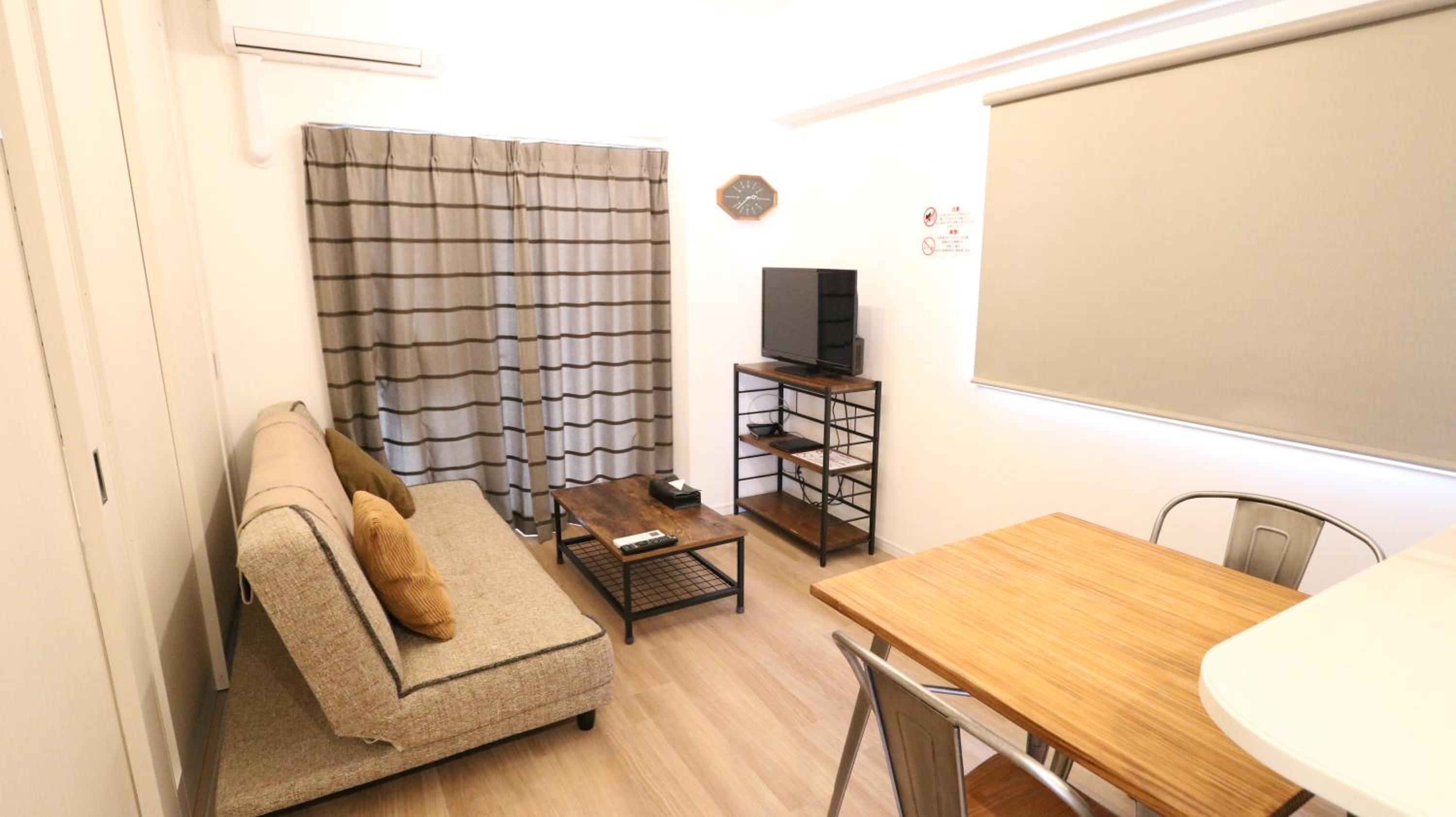 Deluxe Room with Kitchen (2 Double Beds and 1 Sofa Bed) - Non-Smoking - Photo 6