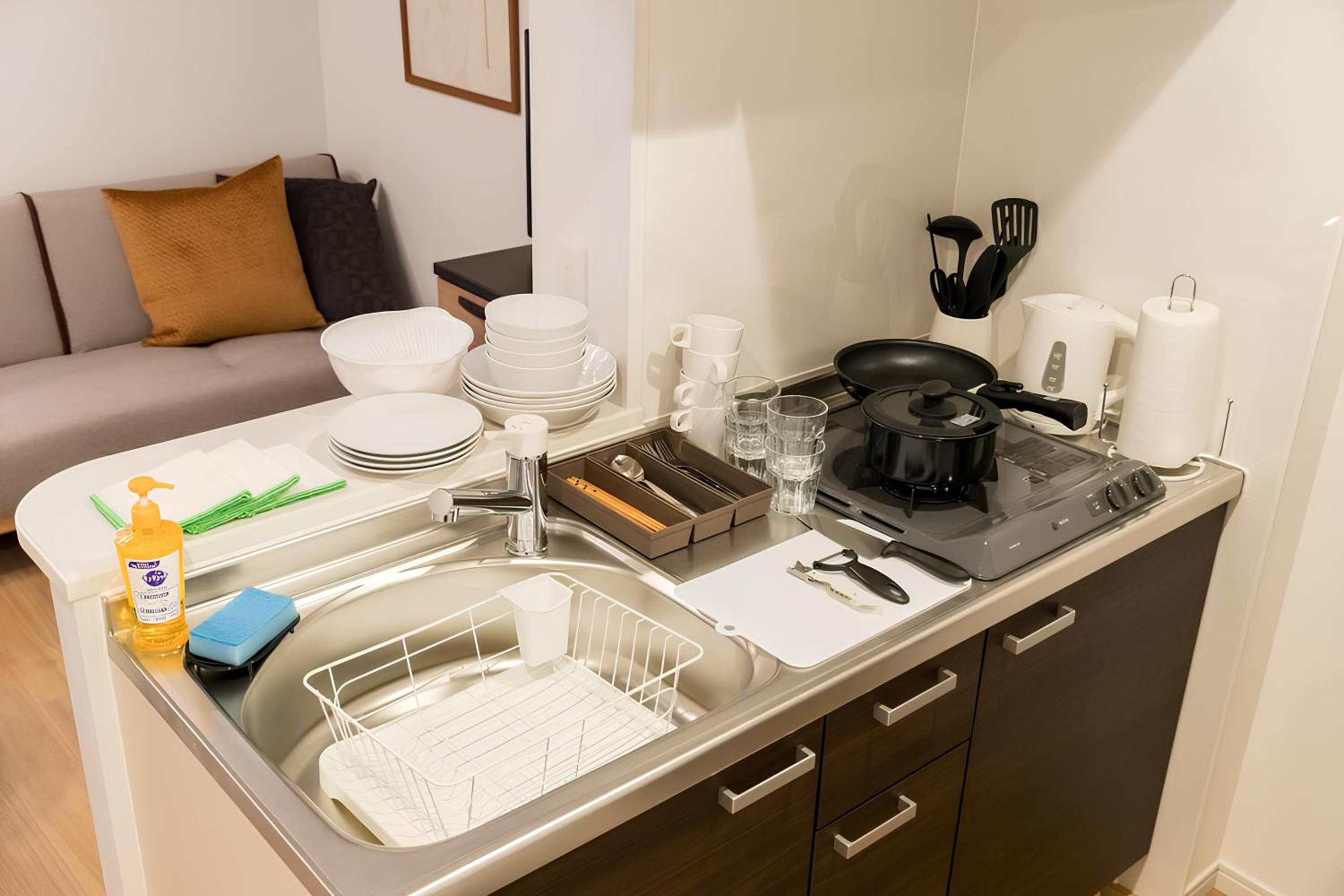 Deluxe Room with Kitchen (2 Double Beds and 1 Sofa Bed) - Non-Smoking - Photo 9