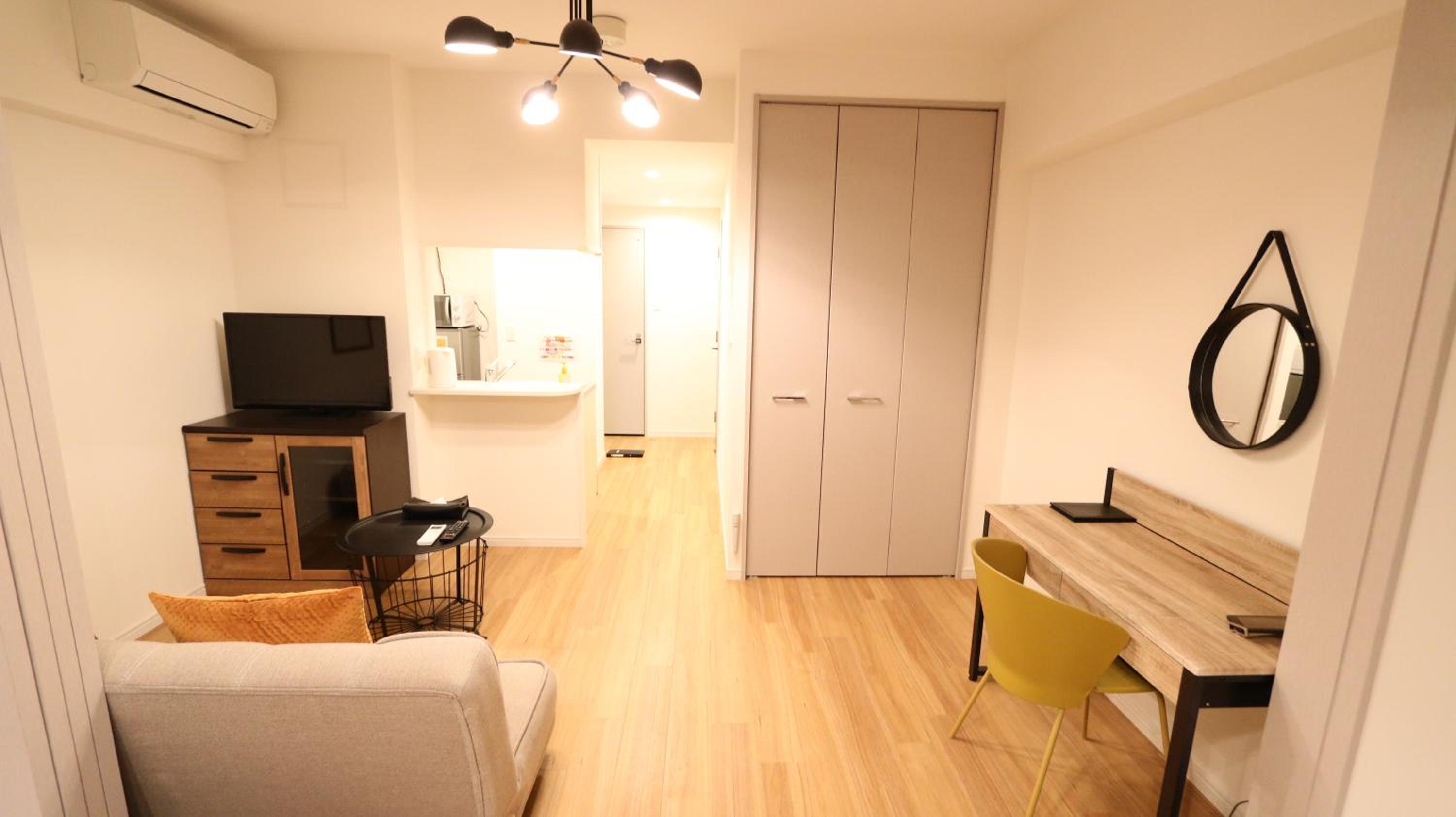 Deluxe Room with Kitchen (2 Double Beds and 1 Sofa Bed) - Non-Smoking - Photo 11