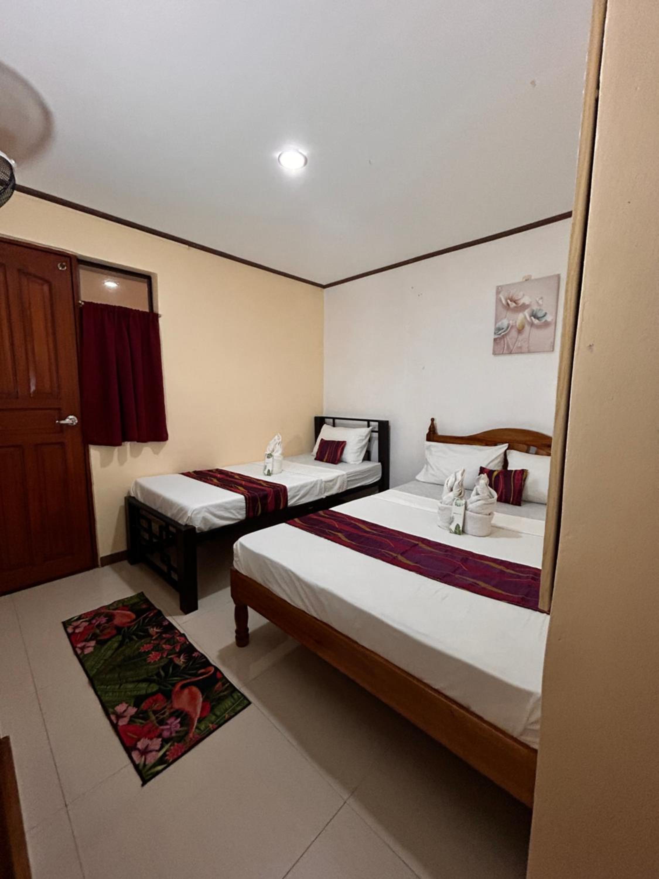 Budget Triple Room - Photo 1