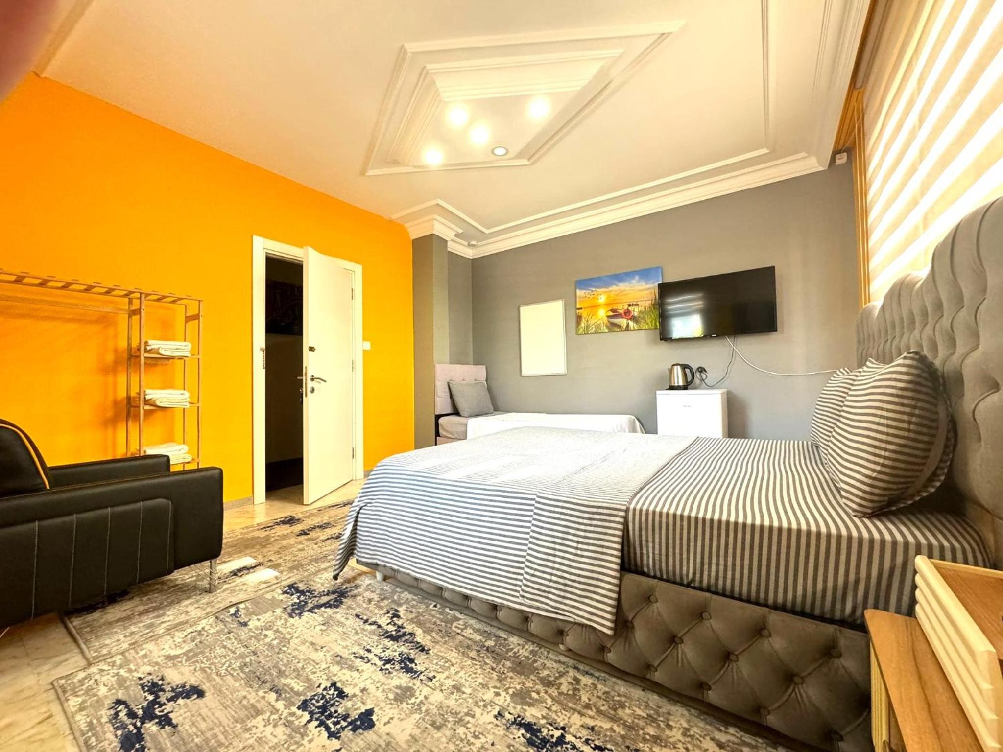 Deluxe Triple Room - Photo 2