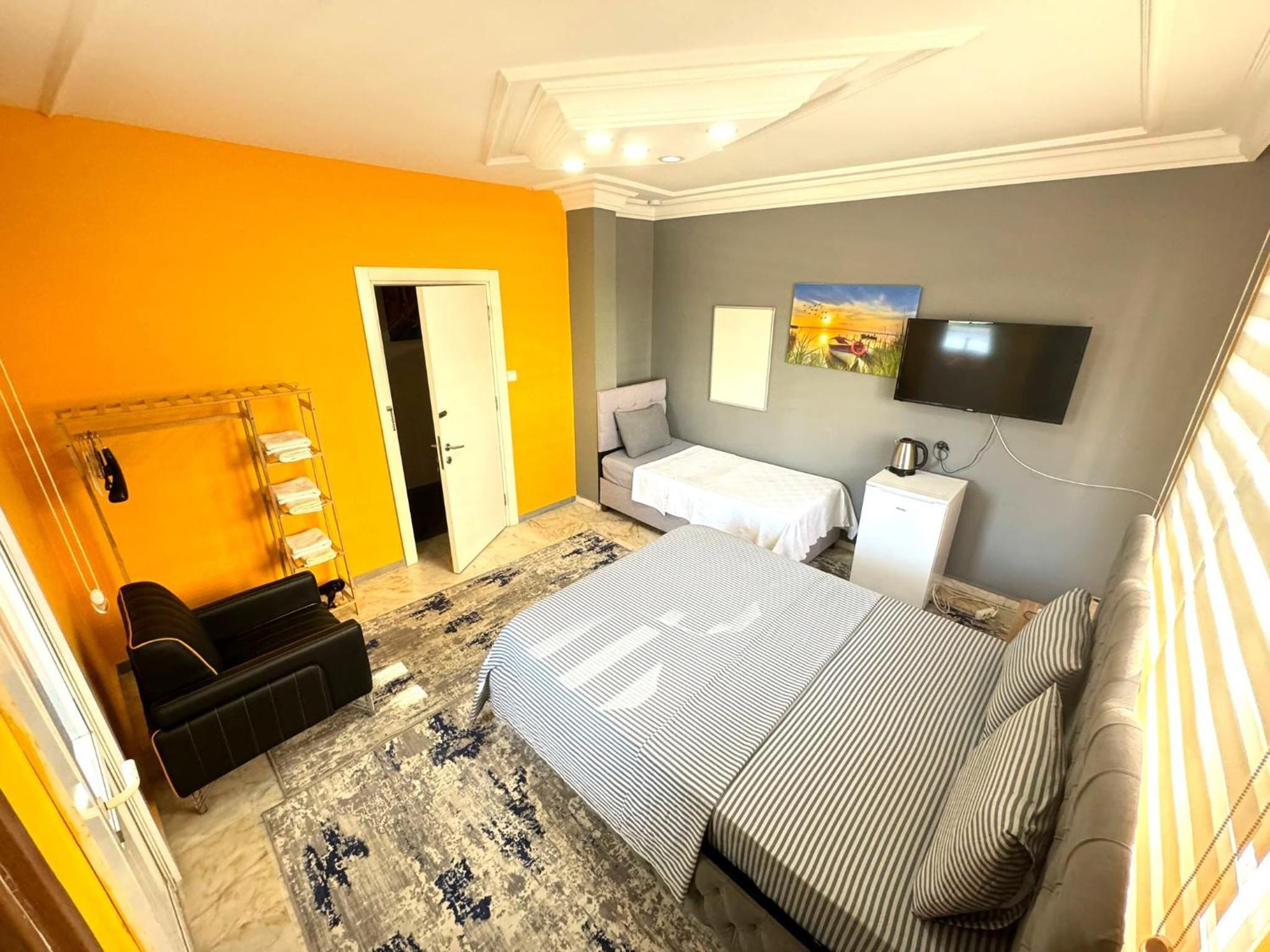 Deluxe Triple Room - Photo 1