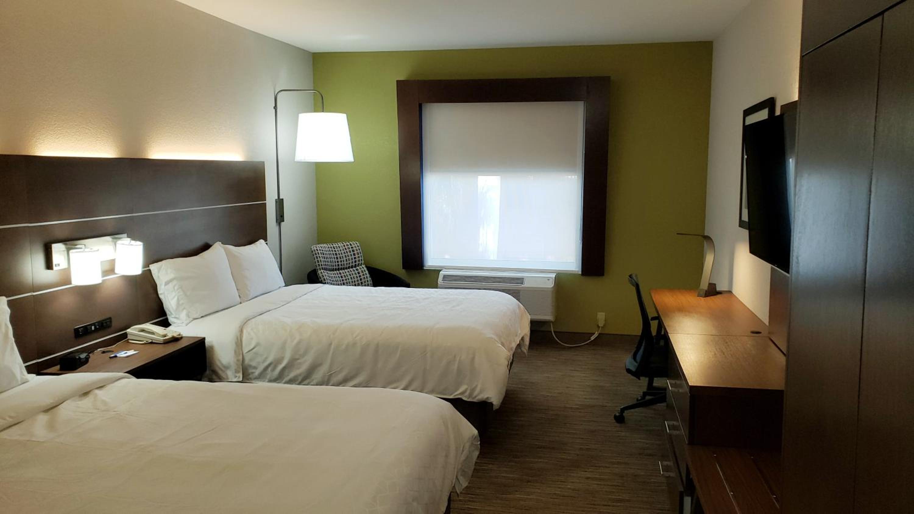 Queen Suite with Two Queen Beds and Sofa Bed - Photo 1