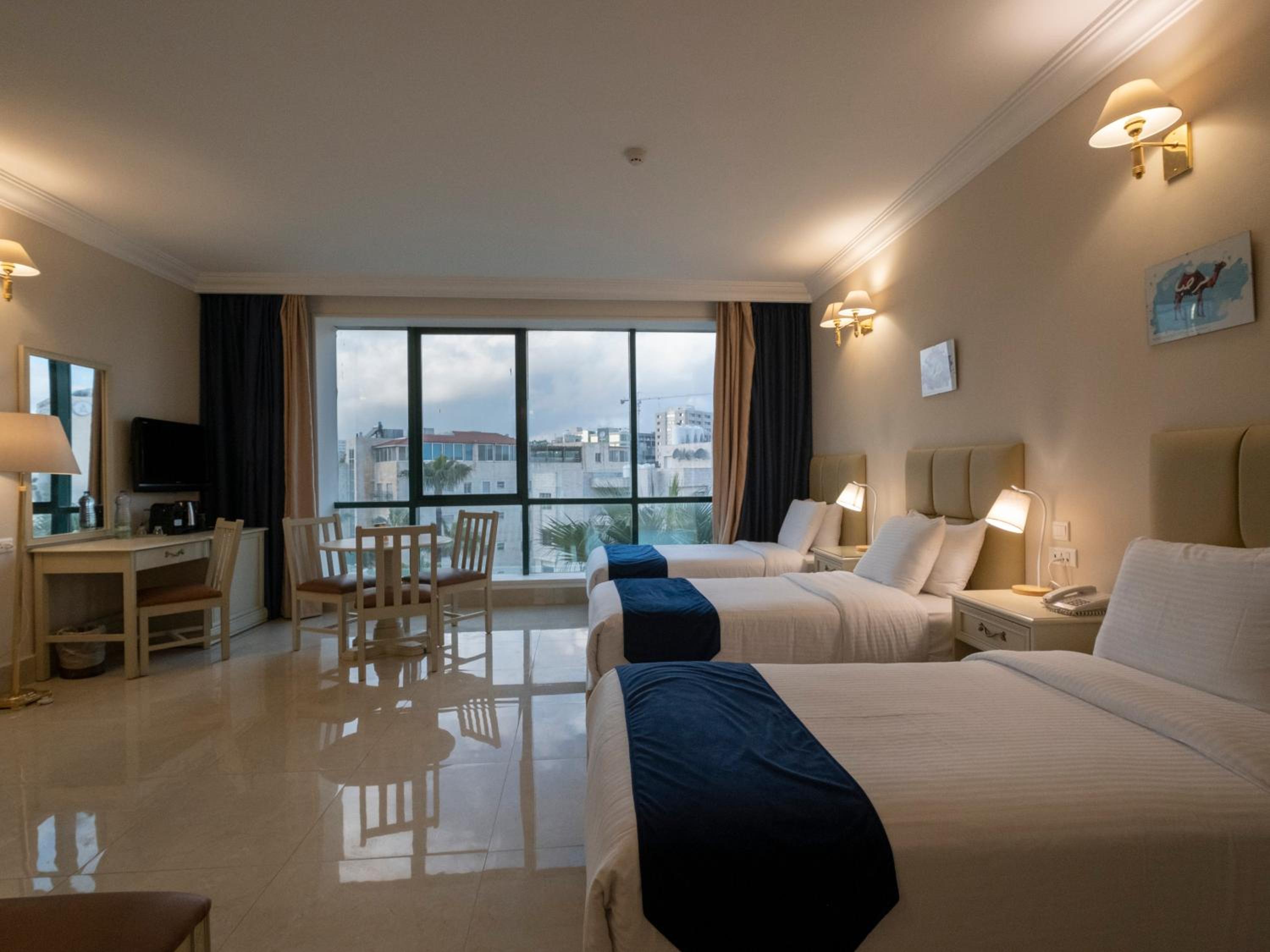 Deluxe Triple Room