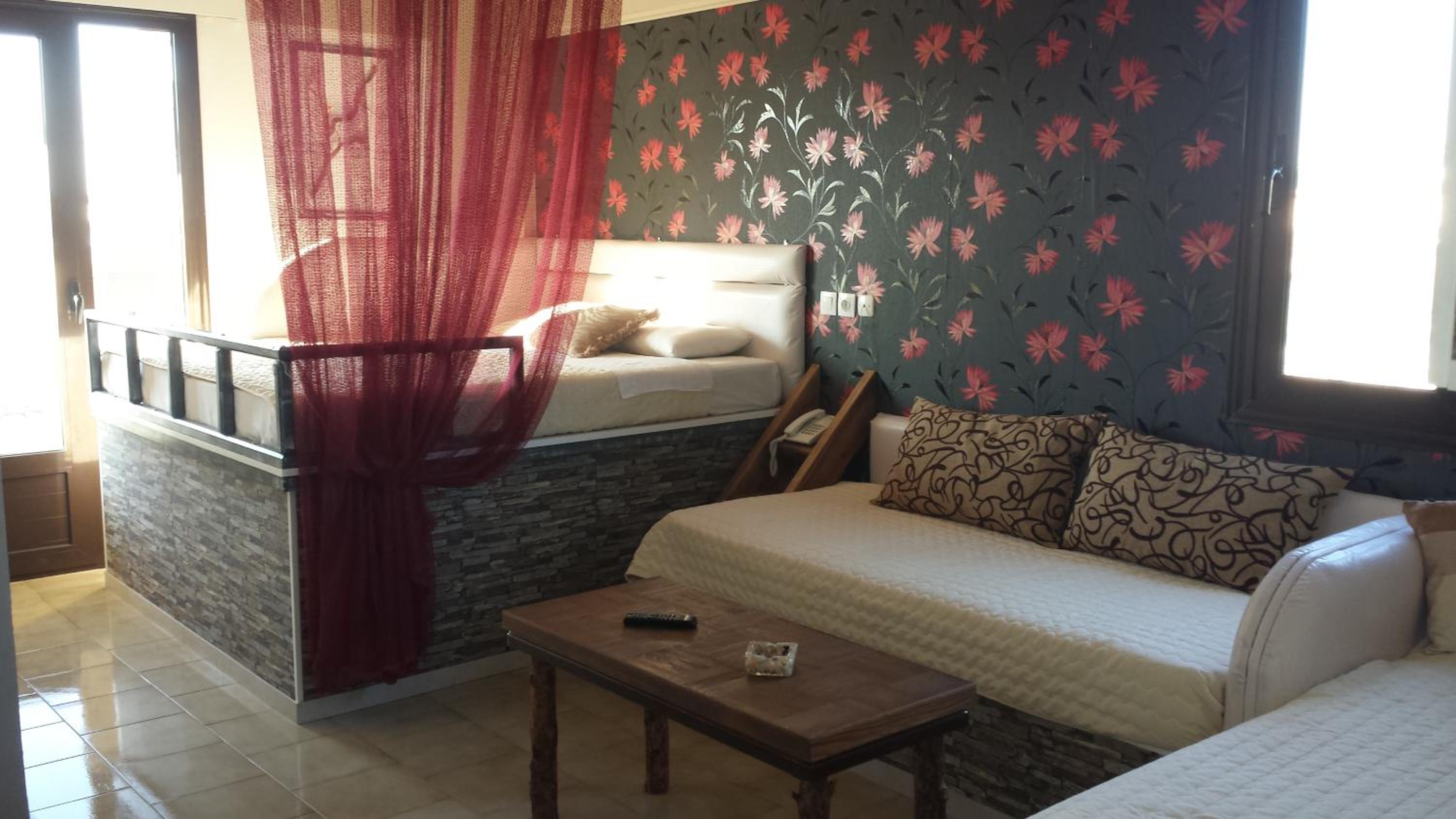 Quadruple Room with Balcony photo 2