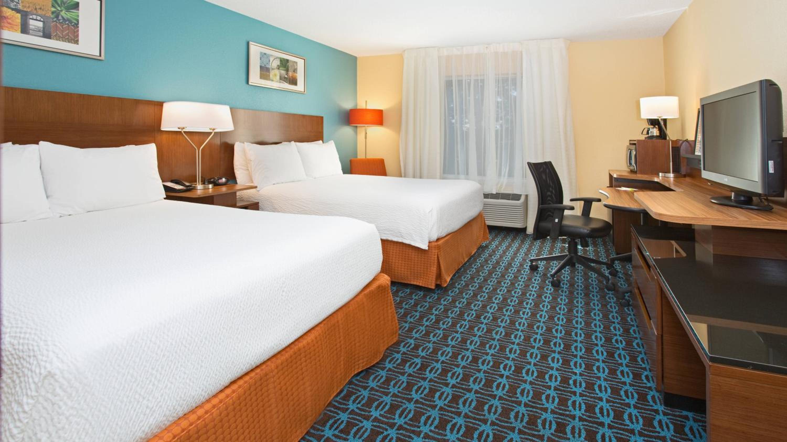 Queen Room with Two Queen Beds - Photo 1