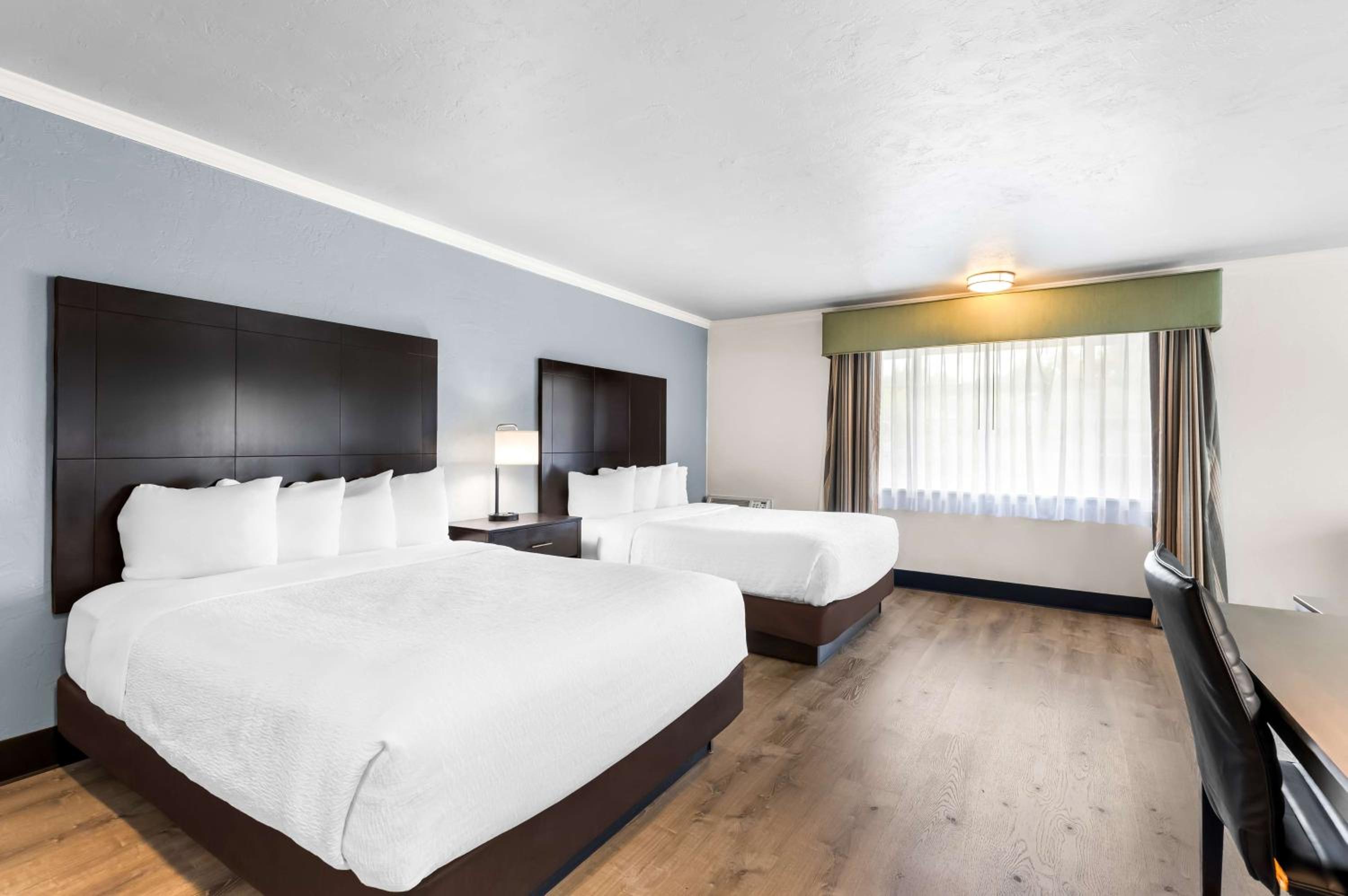 Queen Room with Two Queen Beds and Sofa Bed - Photo 1