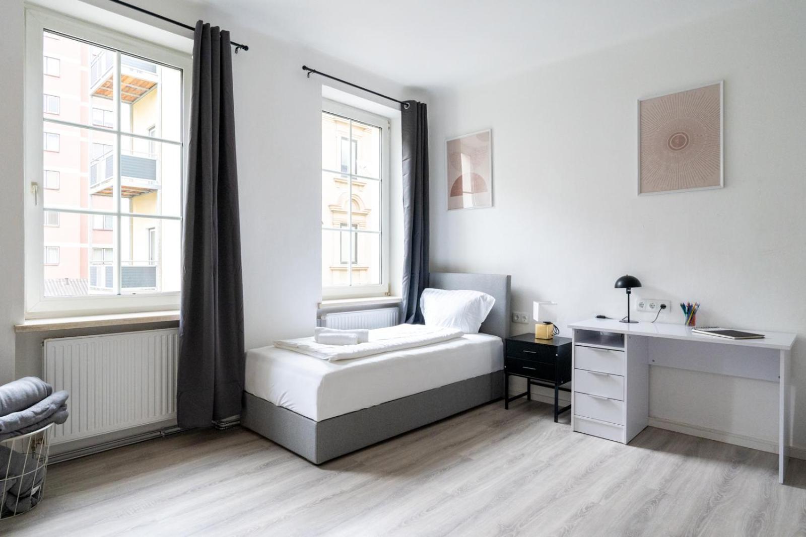 Three-Bedroom Apartment with Balcony photo 3